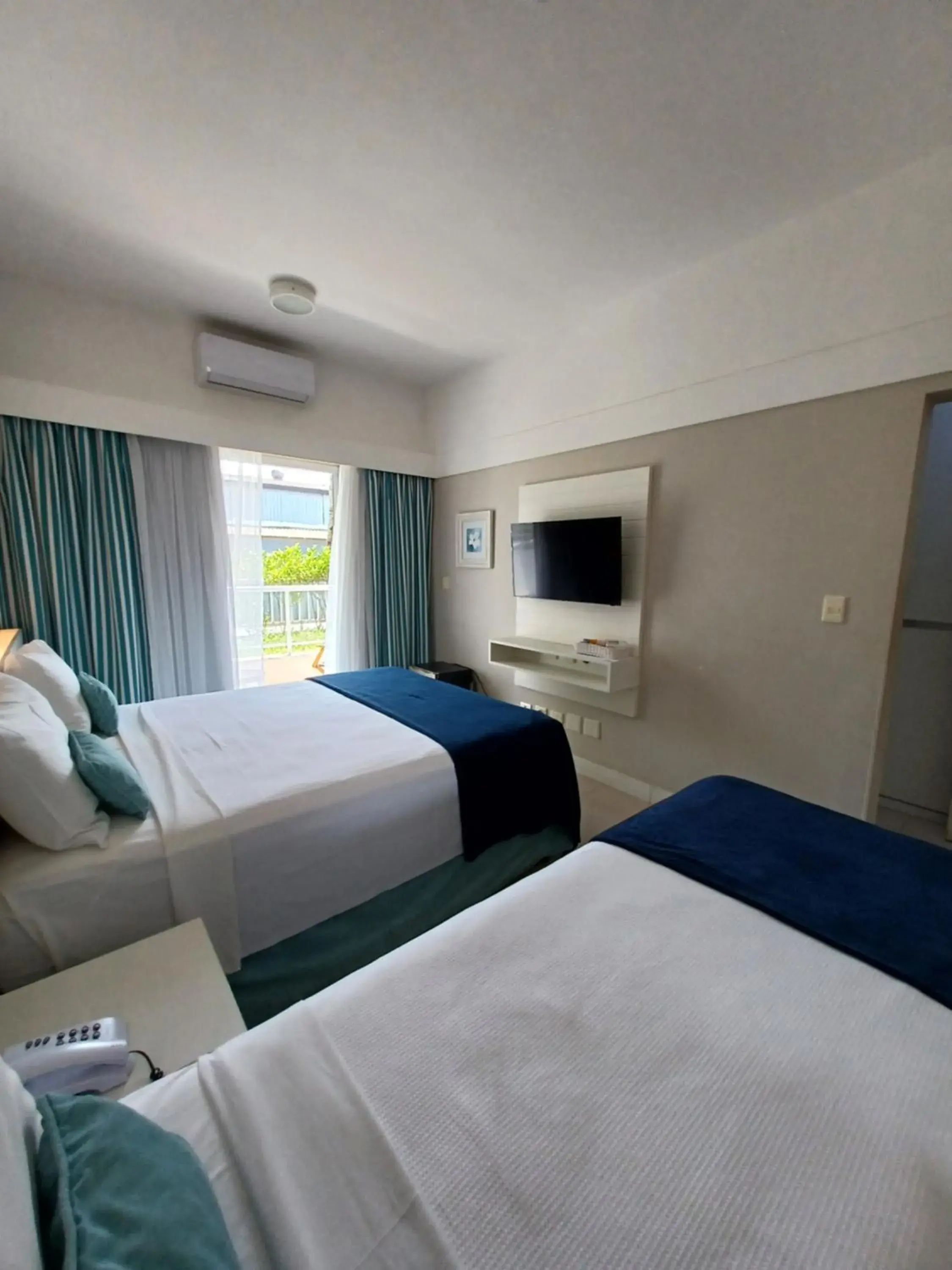 Superior Triple Room in The Falls Hotel - Frente mar Superior Triple Room in The Falls Hotel - Frente mar