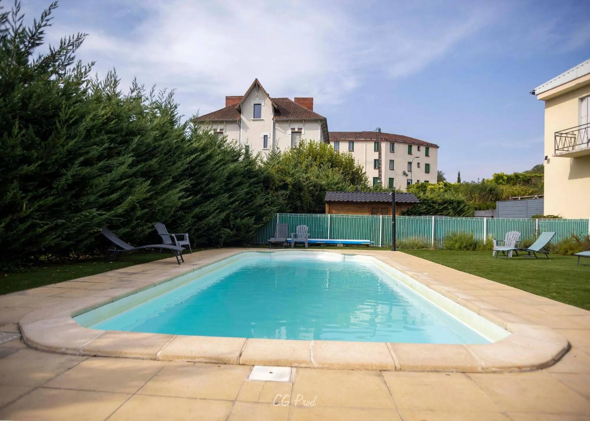 Swimming pool in Les Ambassadeurs Logis Hotels et Restaurant