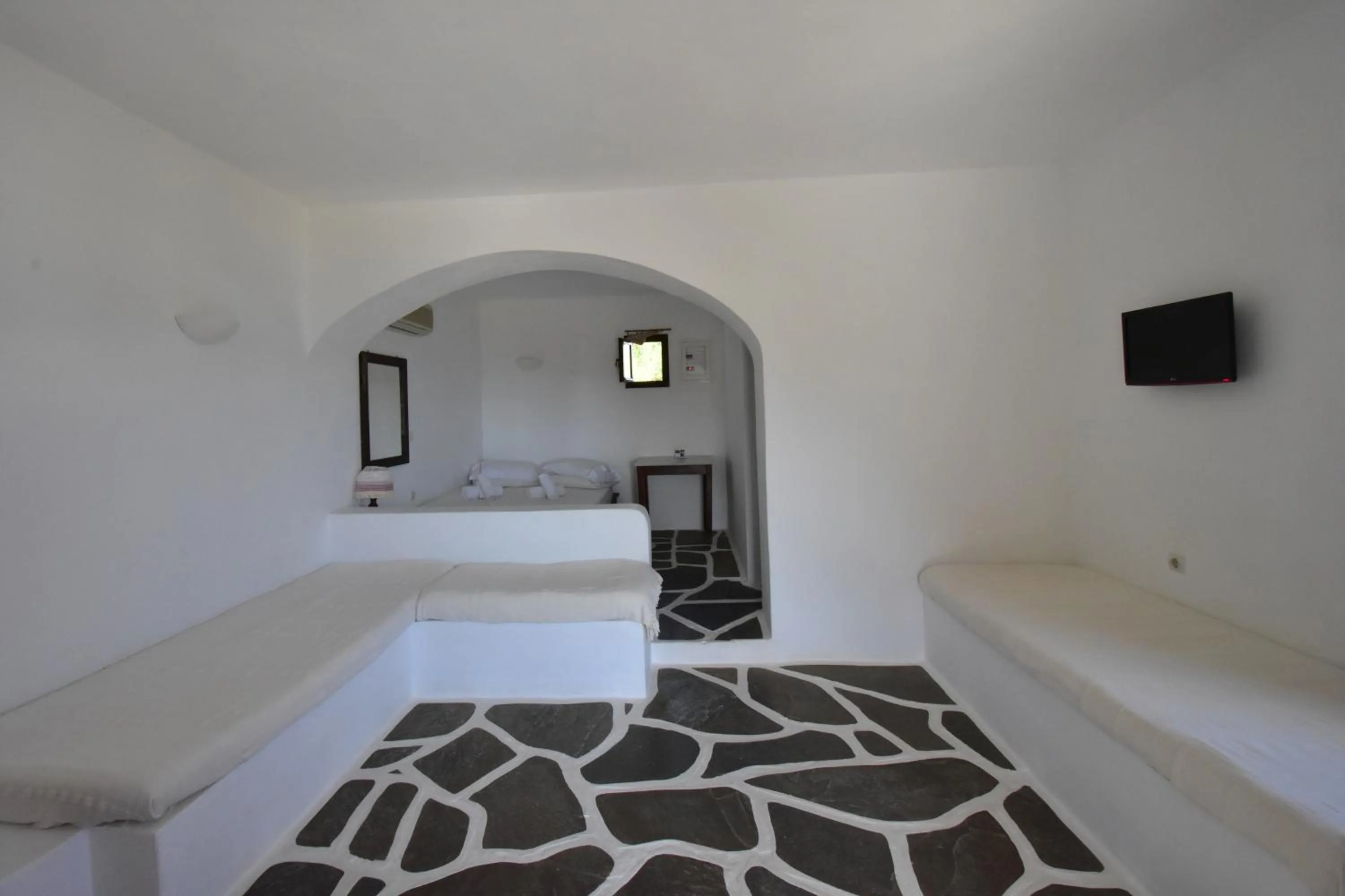 Seating area, Bed in Petra Holiday Village