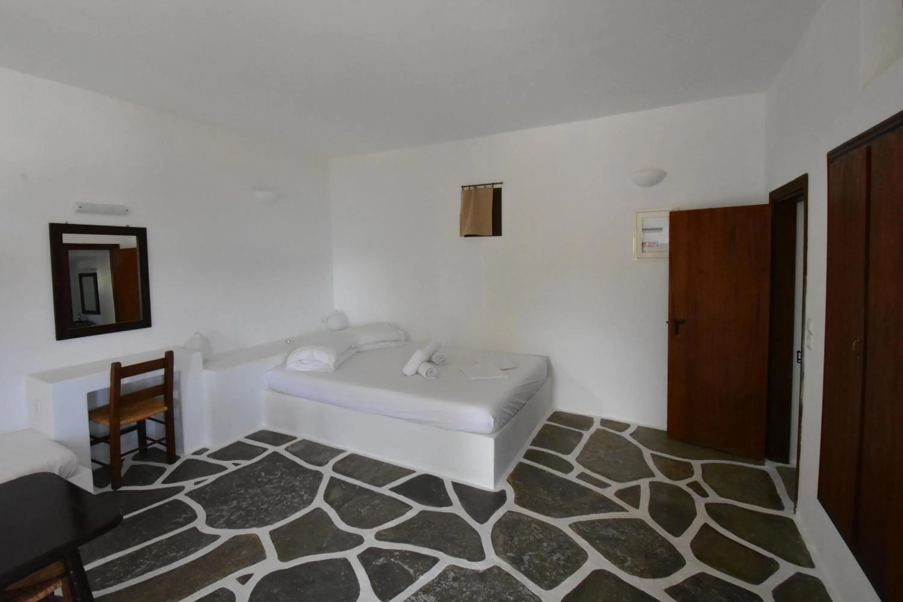 Seating area, Bed in Petra Holiday Village