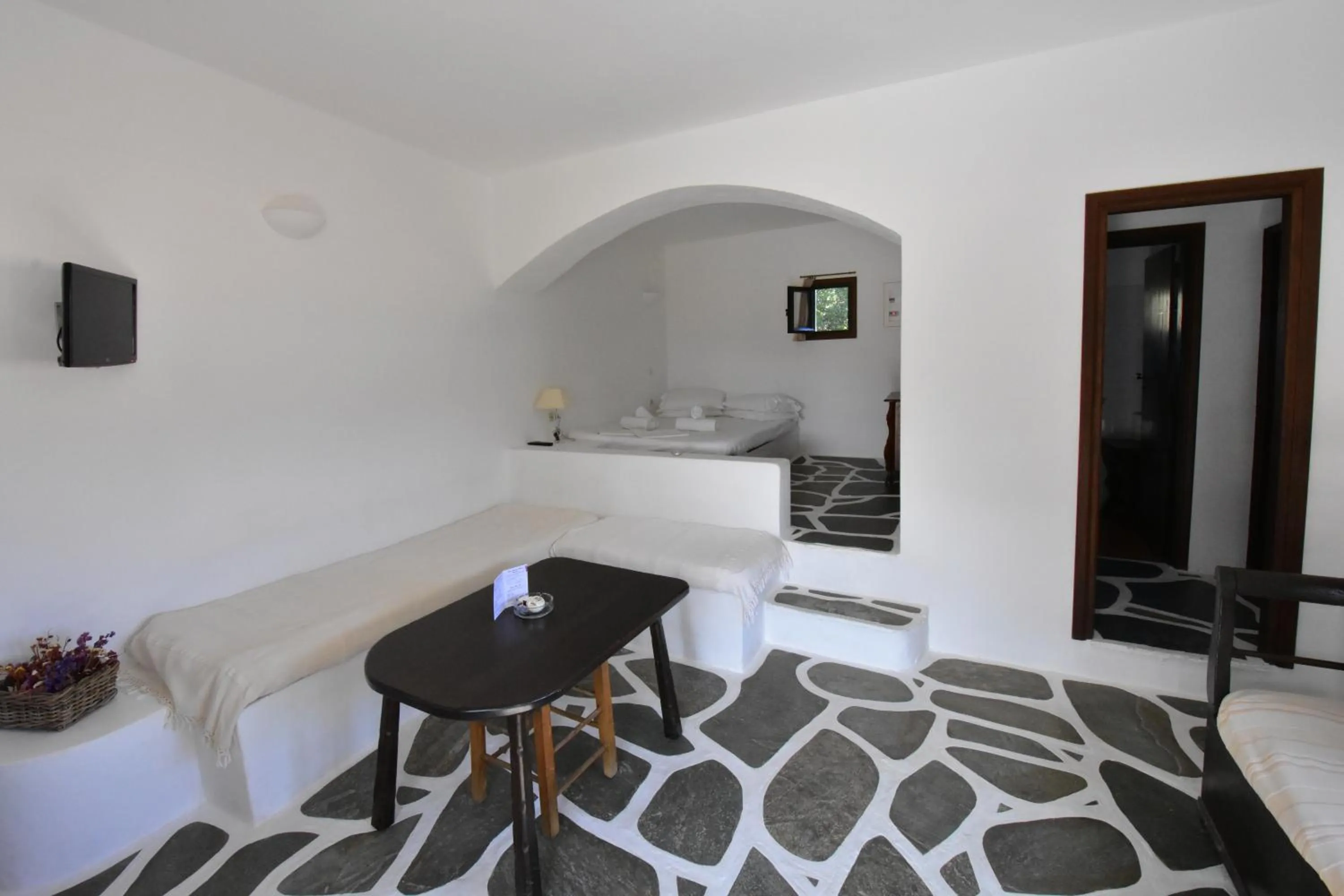 Seating area, Bed in Petra Holiday Village