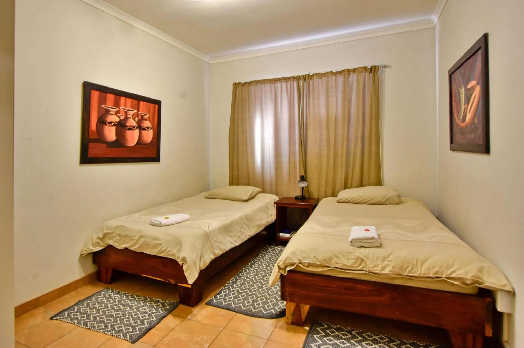 Bed in Anandi Guesthouse Swakopmund