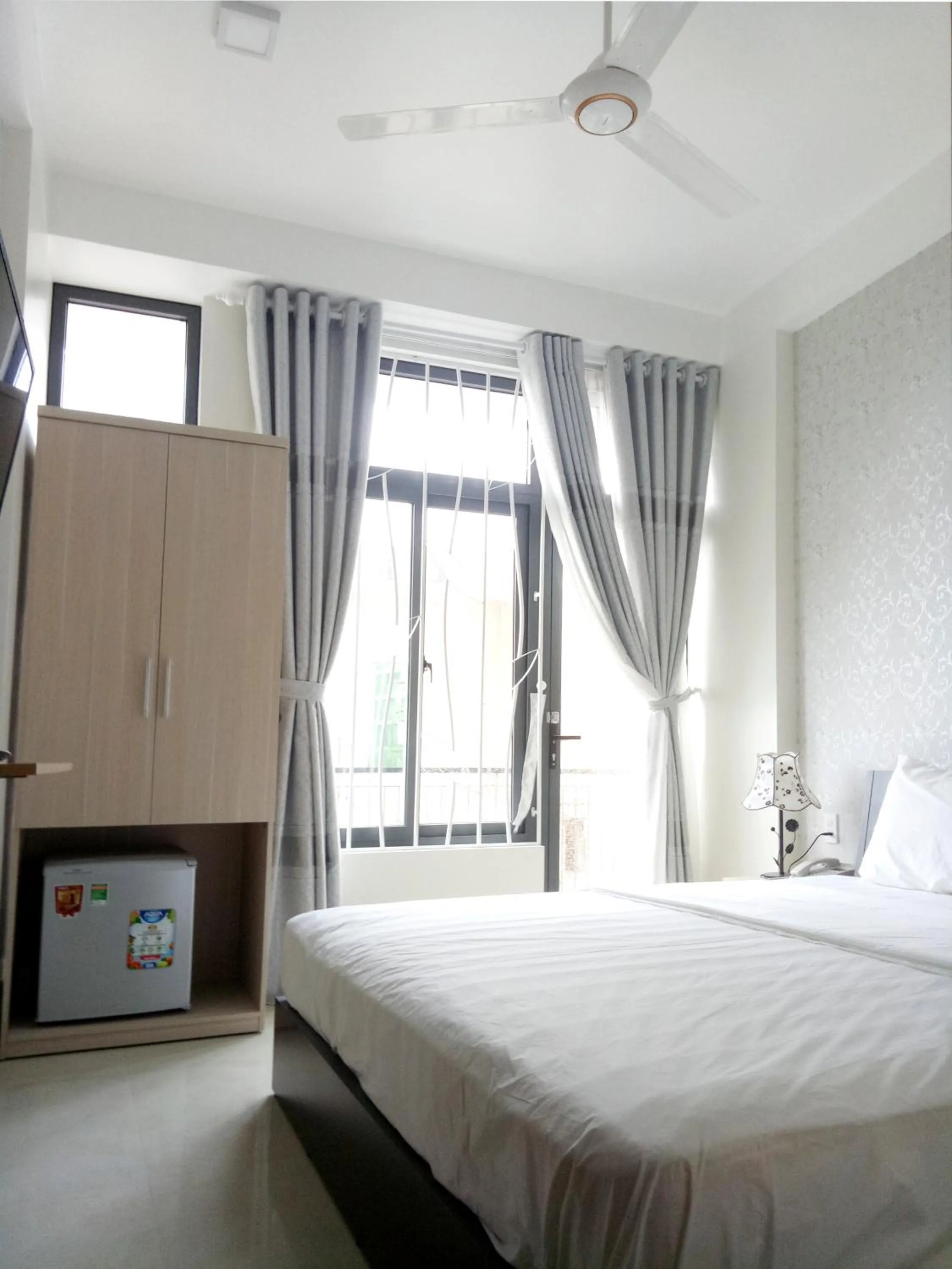 Communal lounge/ TV room in Tin Tin Hue Hostel