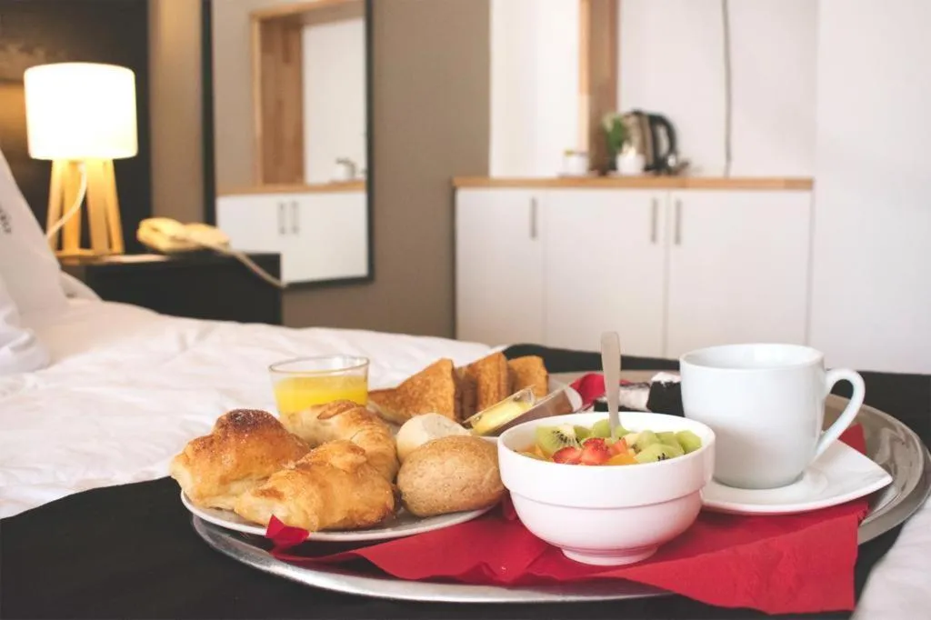 Bed in Pocitos Plaza Hotel