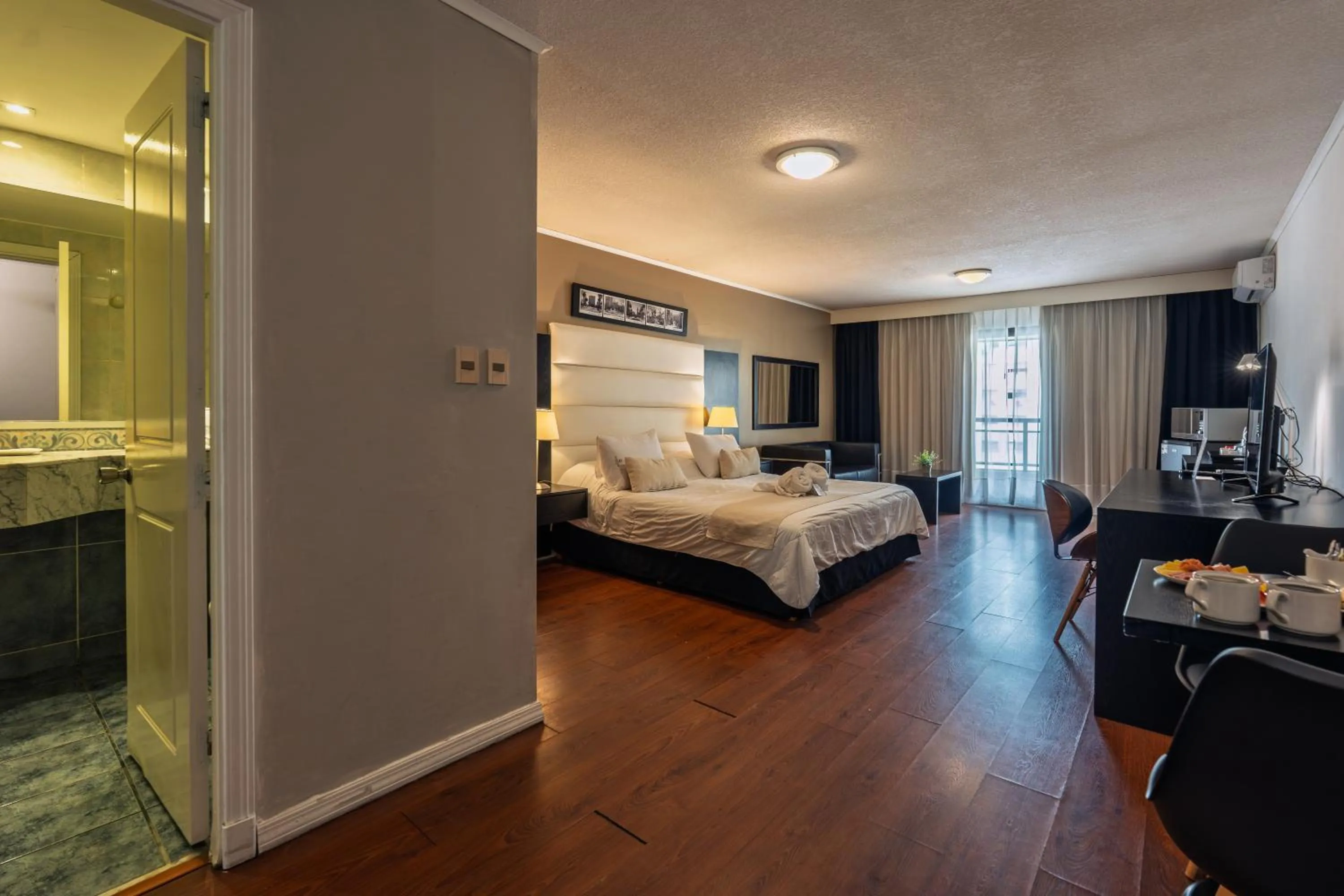 Bed in Pocitos Plaza Hotel