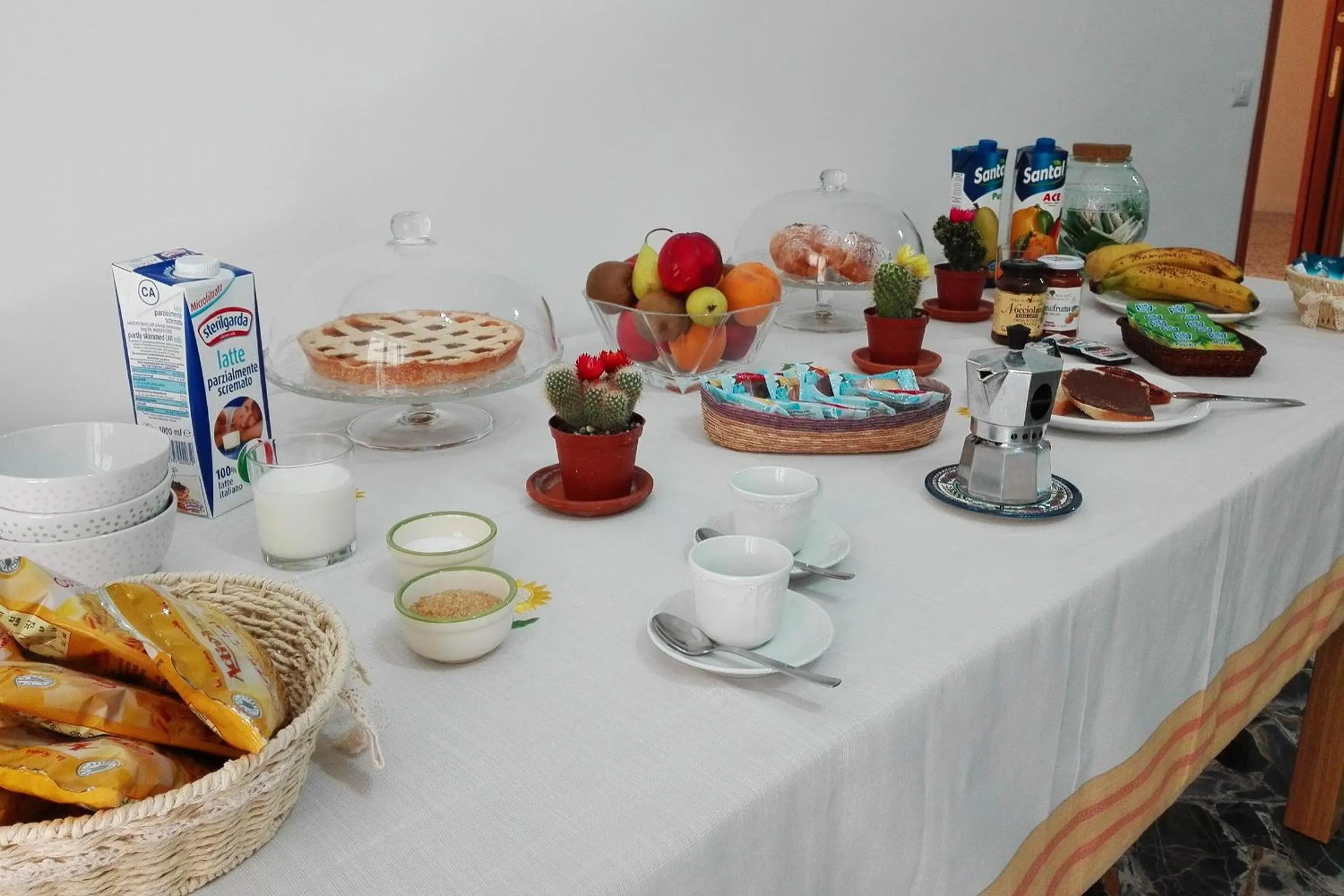 Communal lounge/ TV room in B&B La Primula