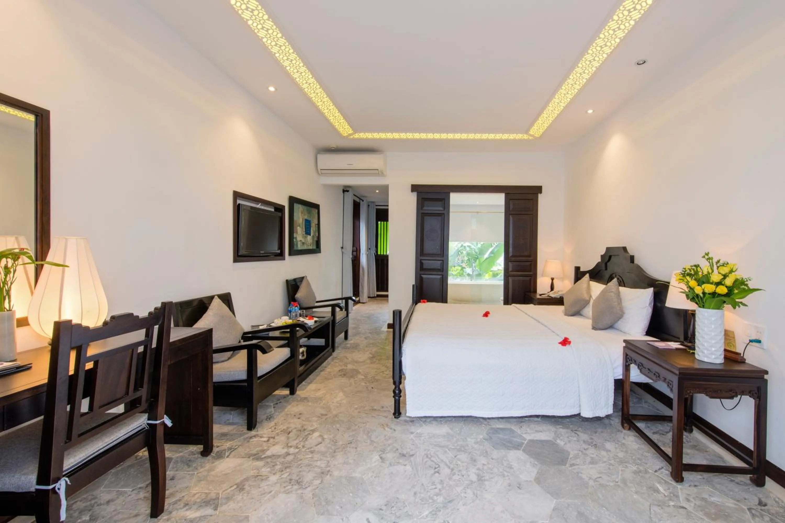 Bedroom in Hoi An Ancient House Resort & Spa