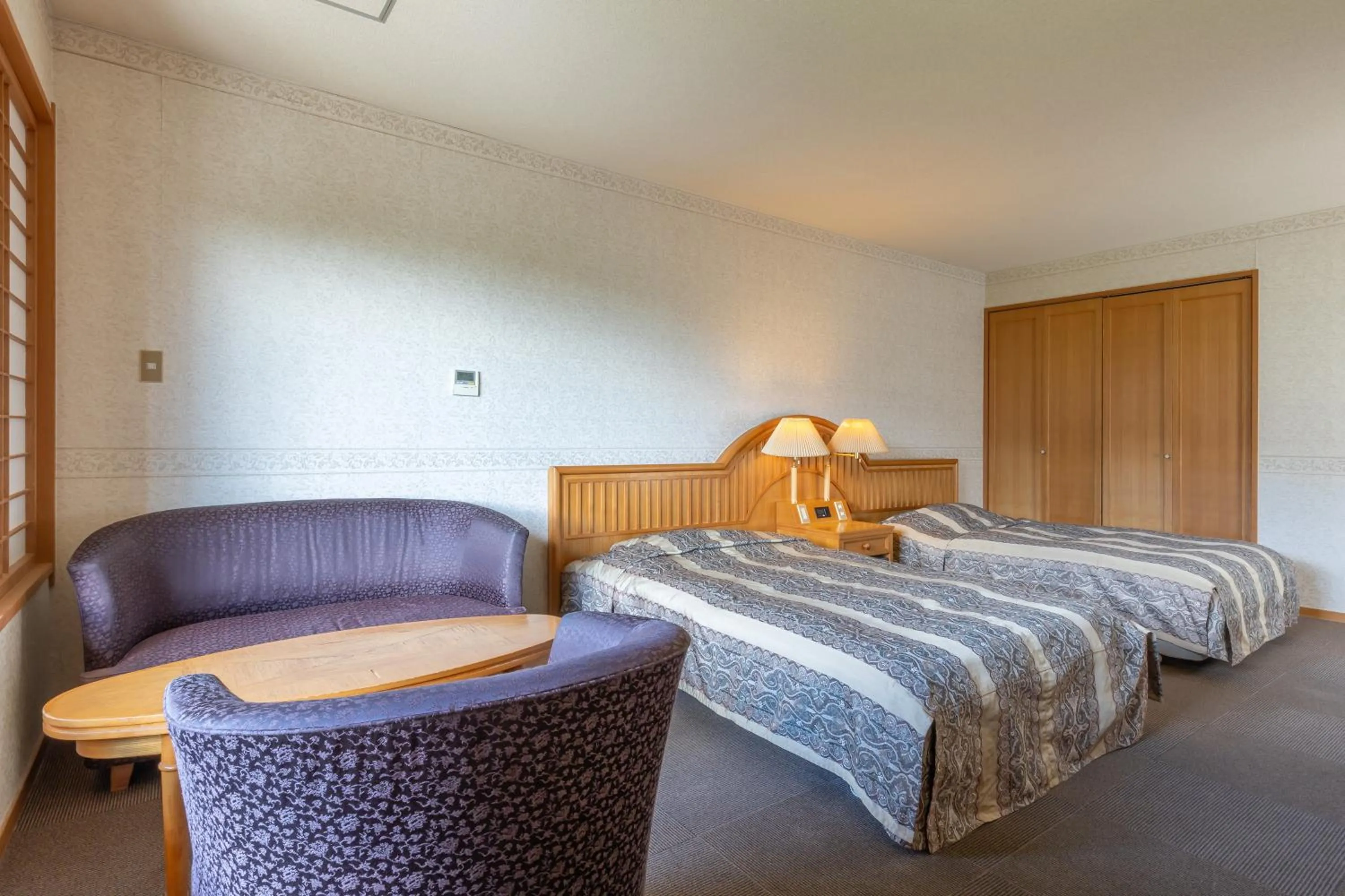 Photo of the whole room, Bed in Plaza Hotel Sanrokuso