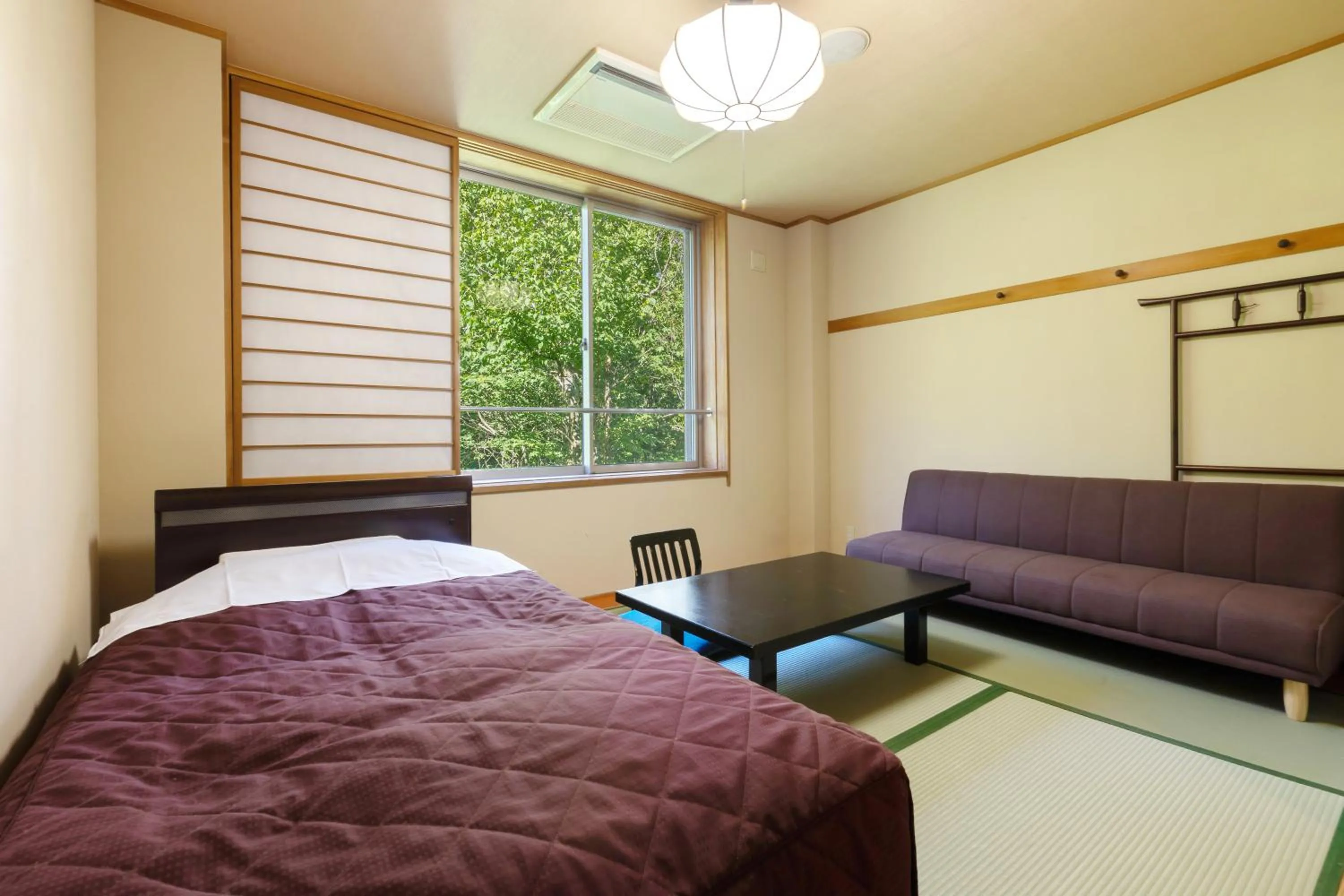 Photo of the whole room, Bed in Plaza Hotel Sanrokuso
