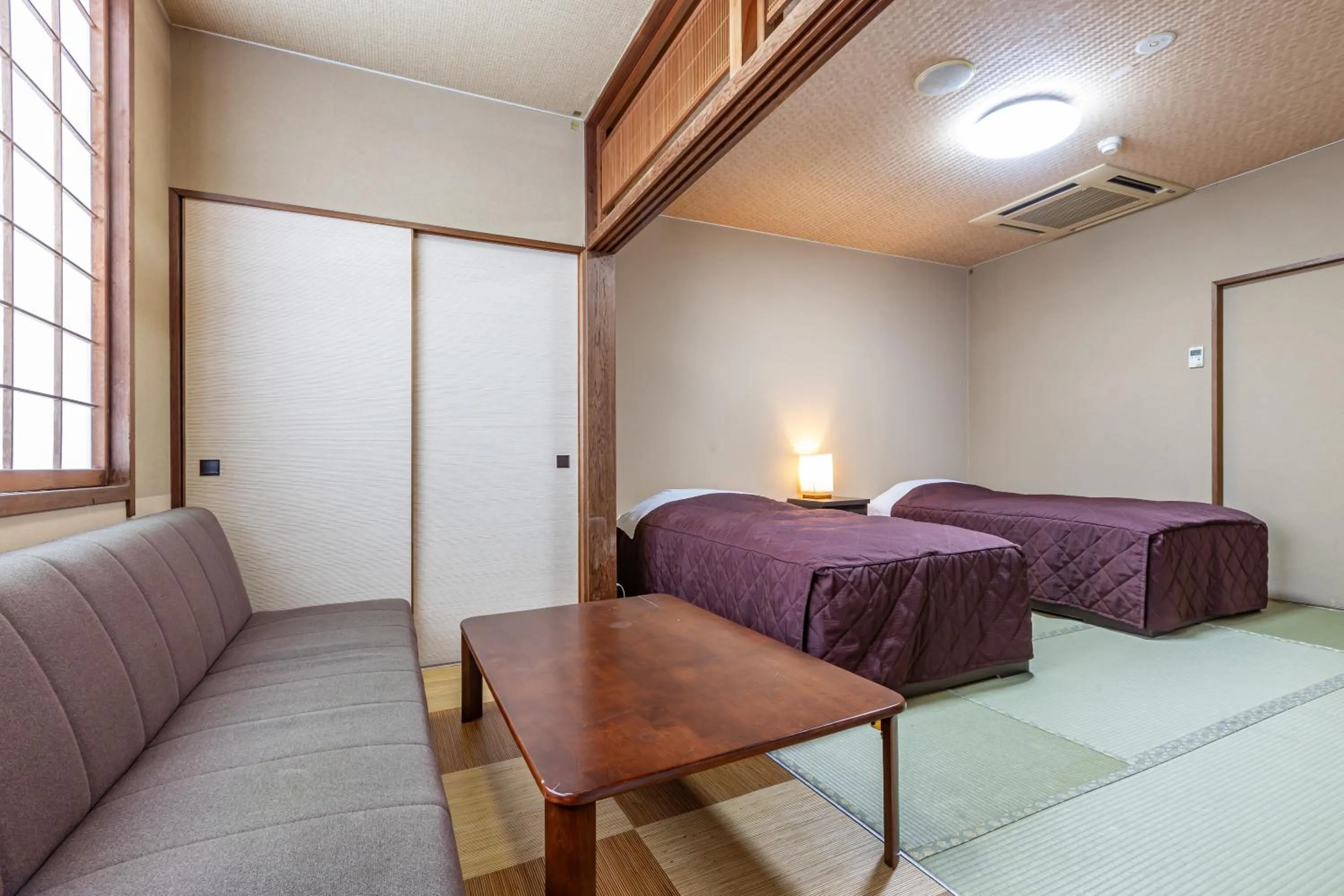 Photo of the whole room, Bed in Plaza Hotel Sanrokuso