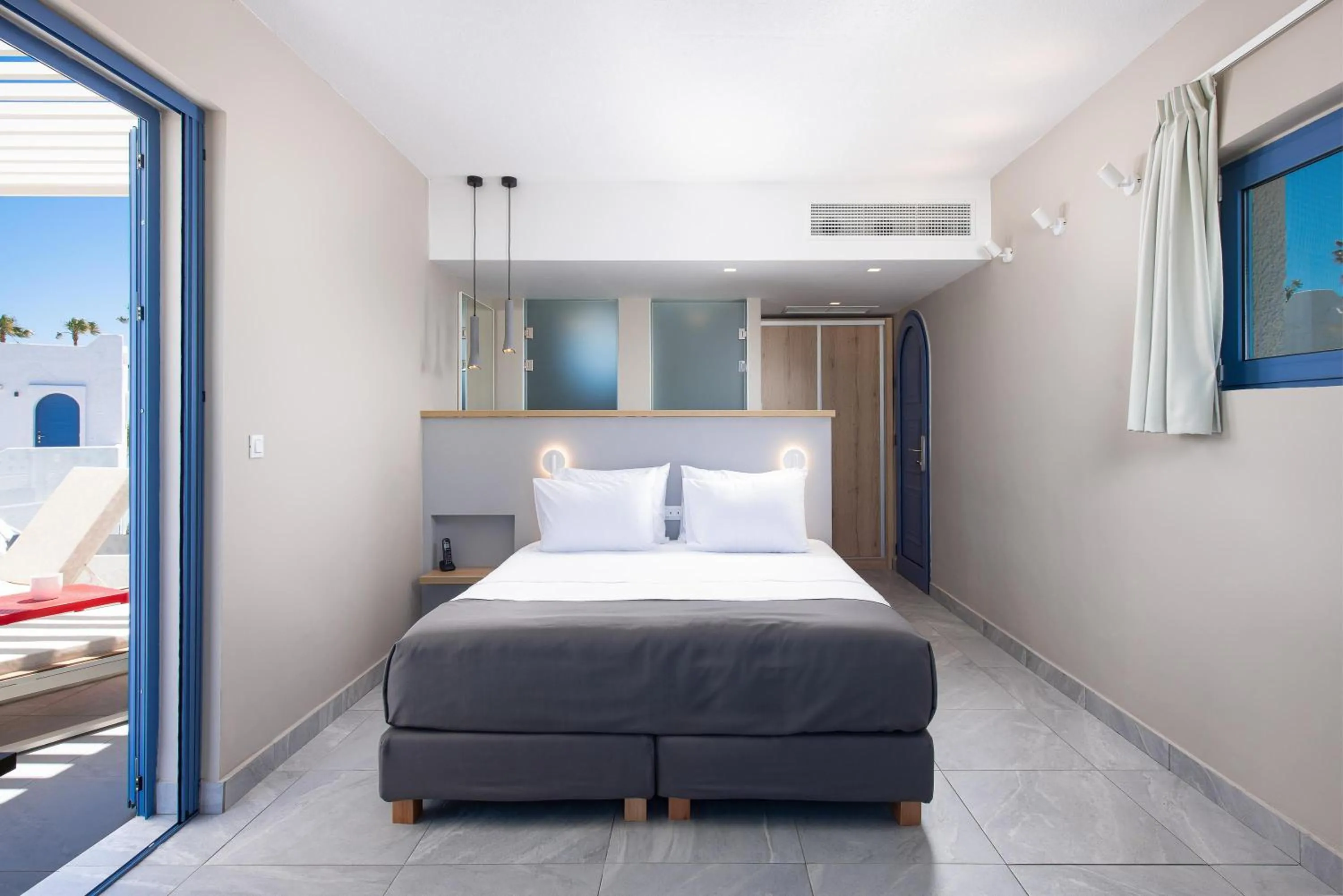 Photo of the whole room, Bed in The Aeolos Beach Hotel