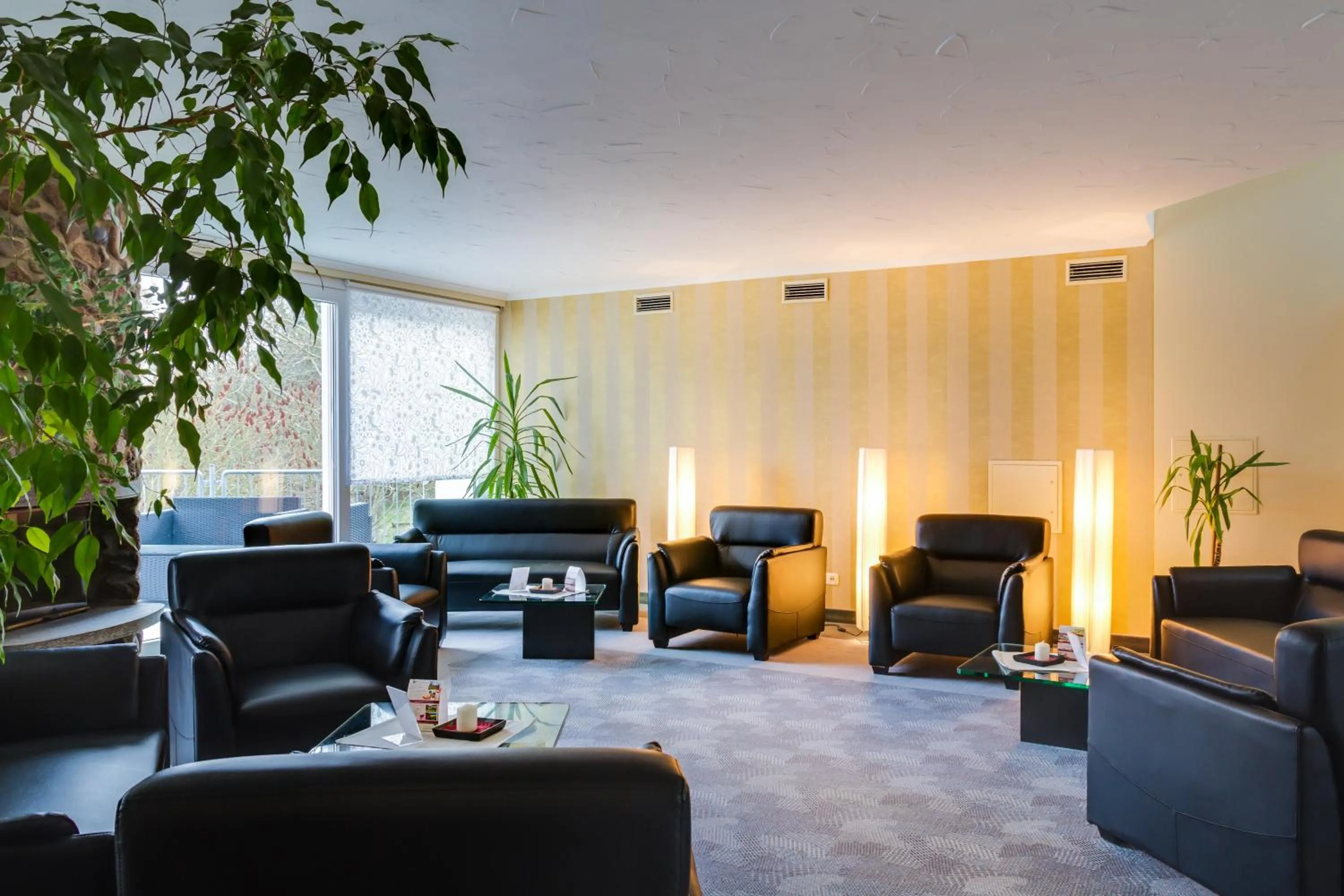 Communal lounge/ TV room in Seehotel Luisenhof