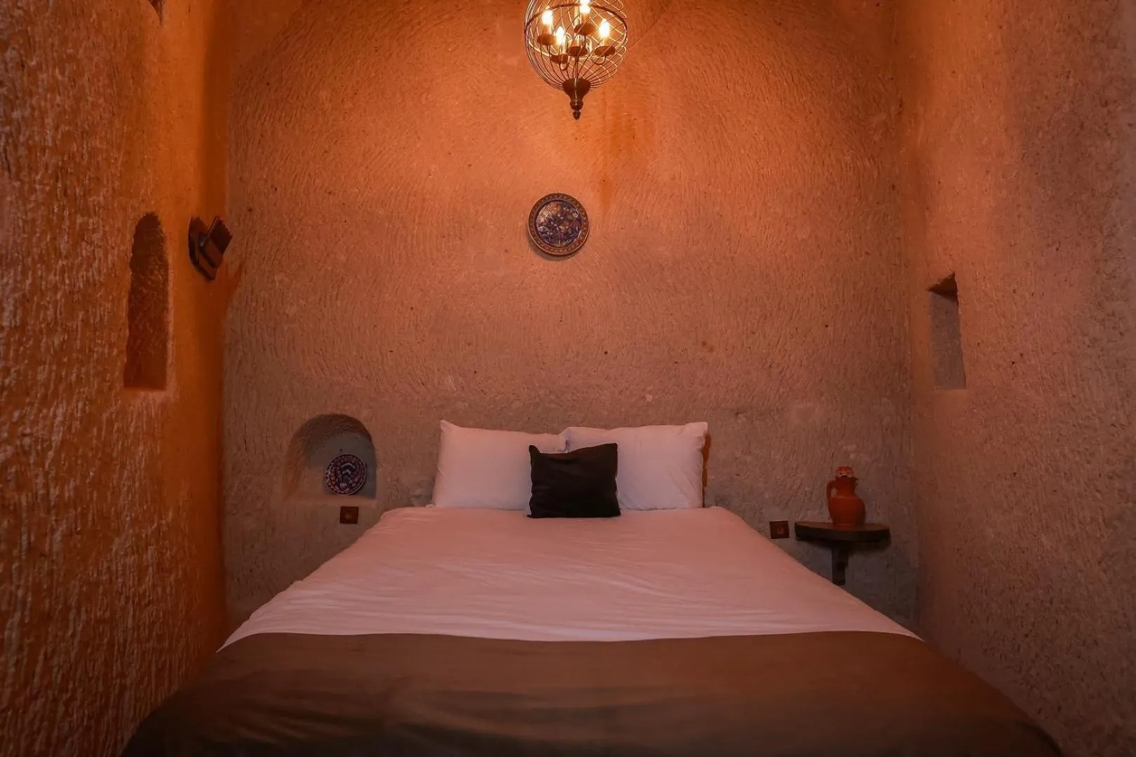 Bed in Mia Cappadocia Cave Hotel