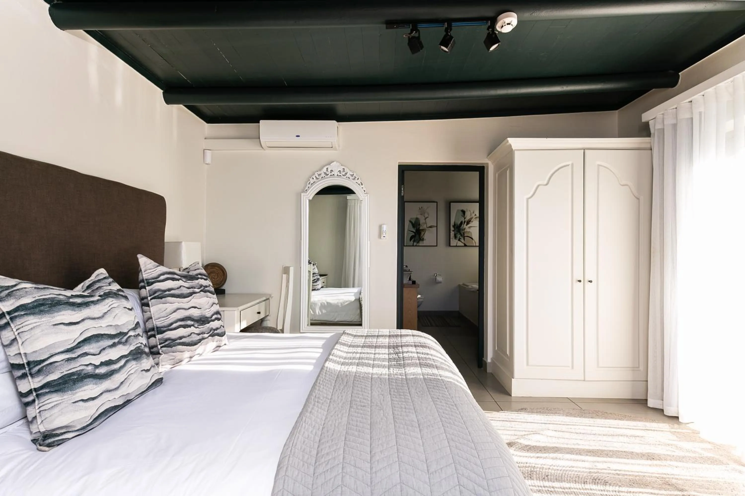 Bed in Abalone Hotel & Villas