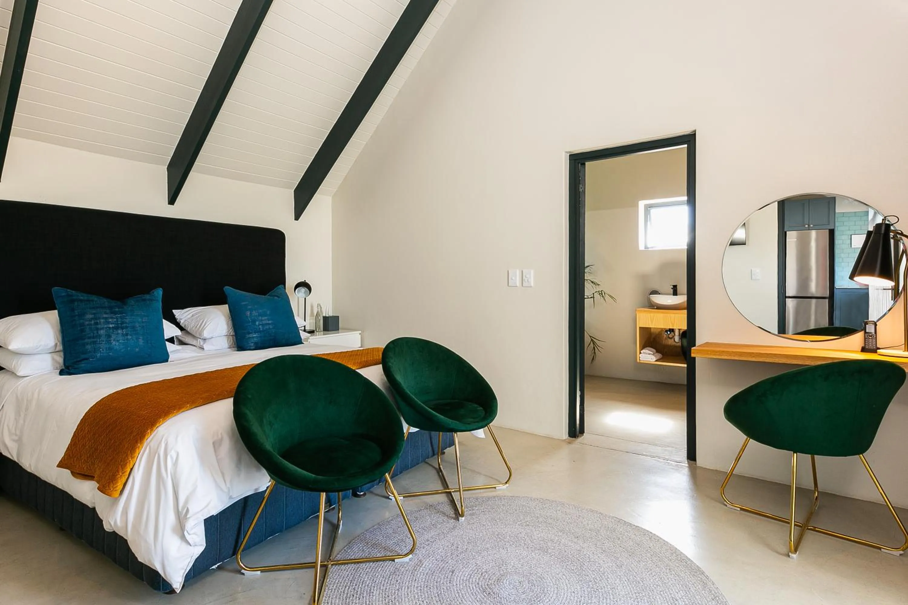 Bed in Abalone Hotel & Villas