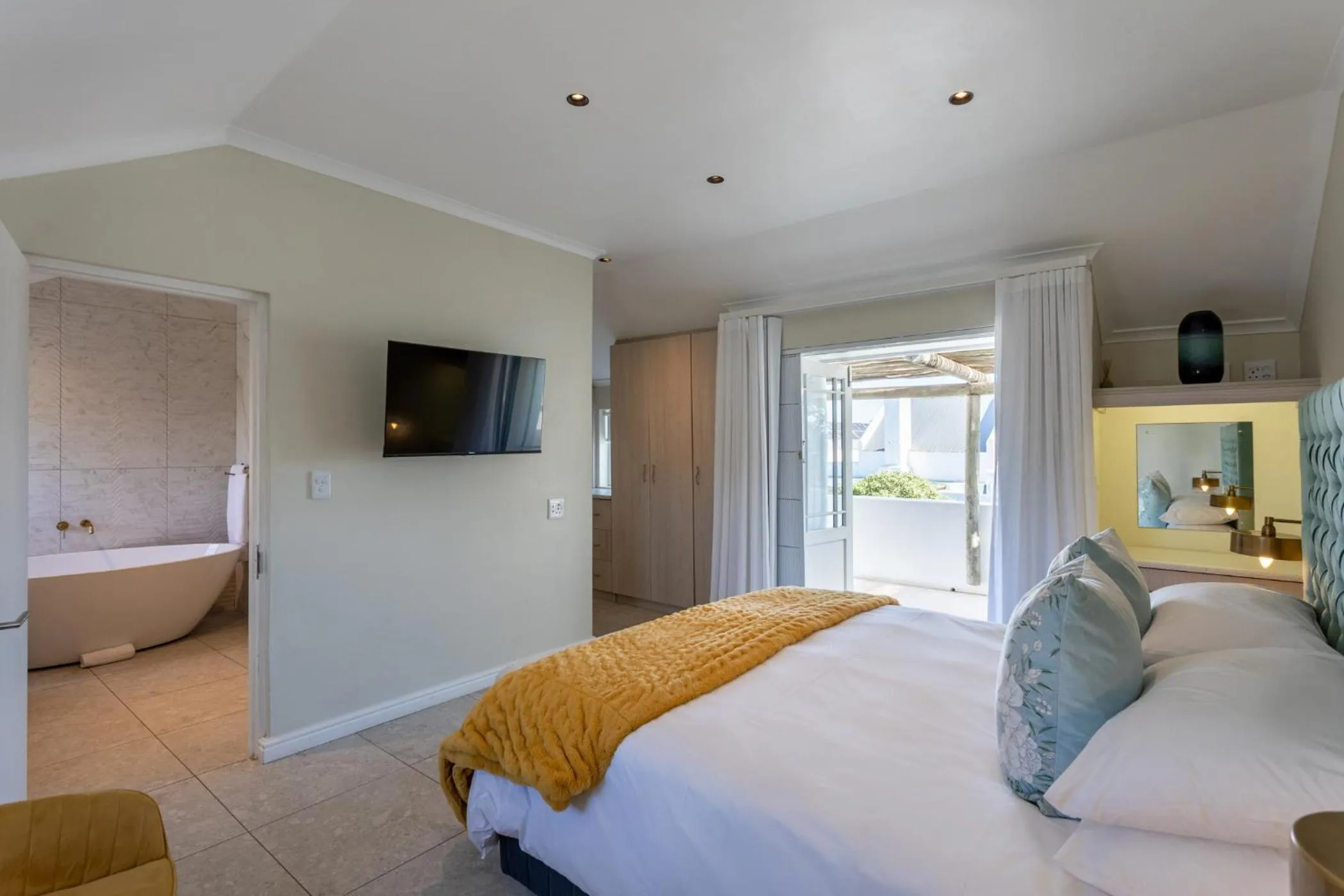 Bed in Abalone Hotel & Villas