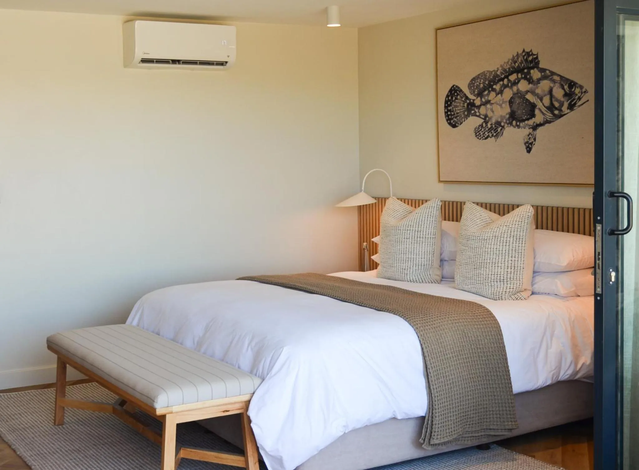 Bed in Abalone Hotel & Villas