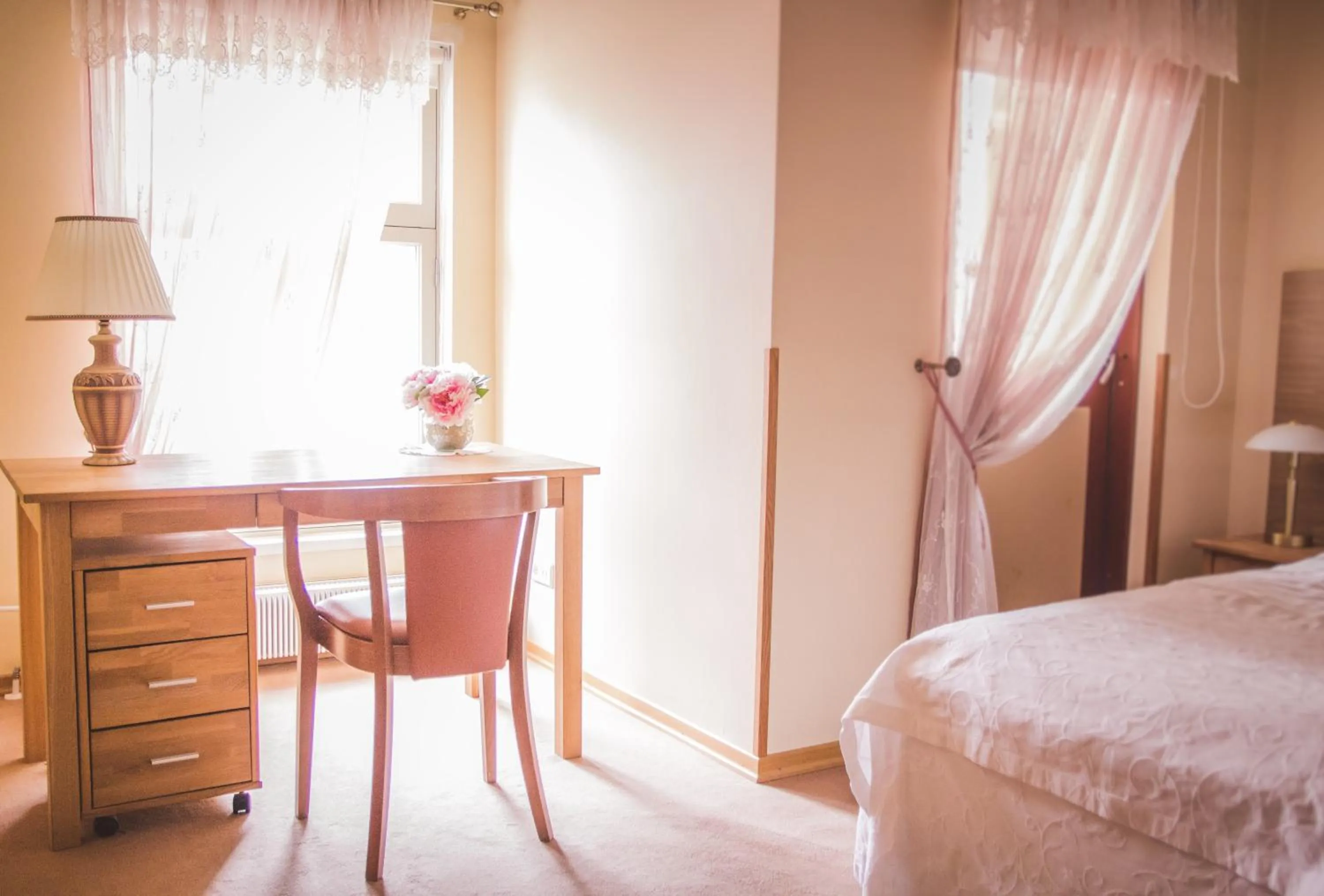 Seating area, Bed in Villa Margaretha Boutique Hotell