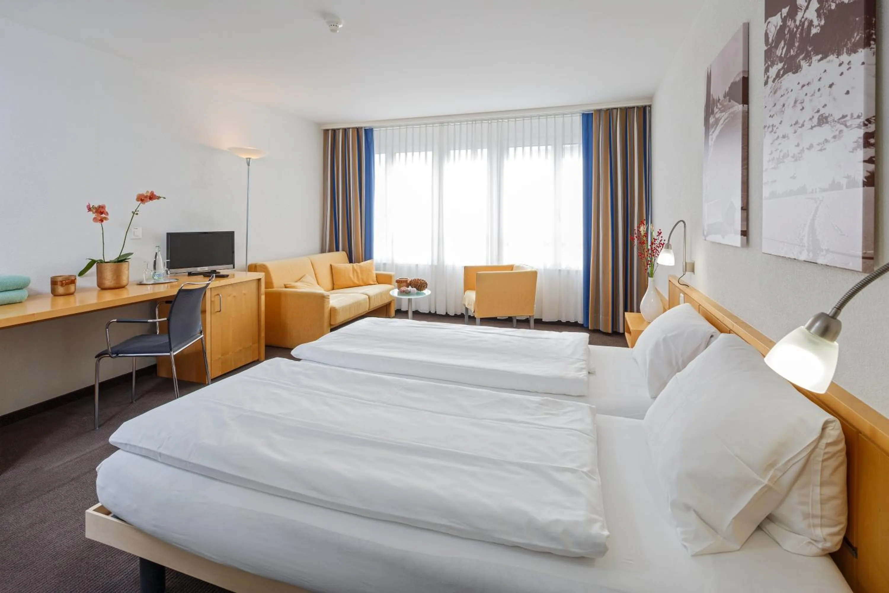 Photo of the whole room, Bed in Hotel Hirschen Wildhaus