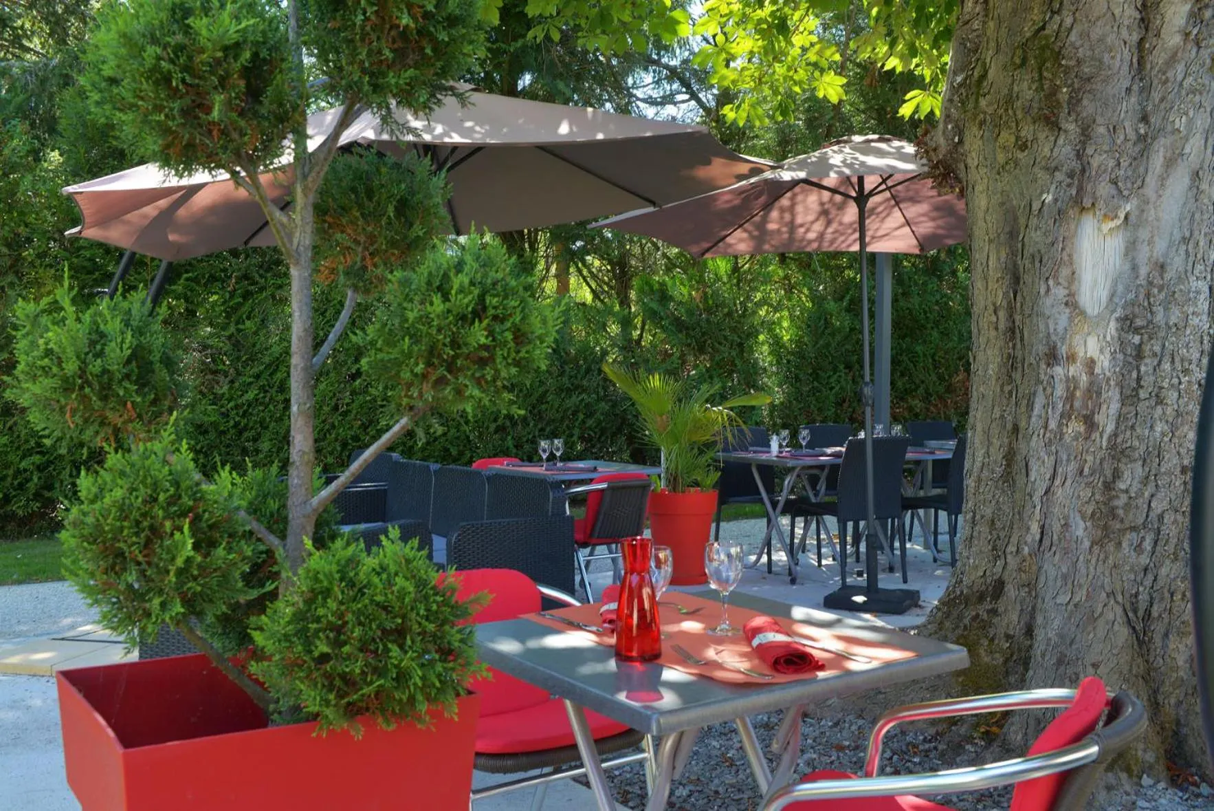 Patio in Logis Hotel Le Prieure