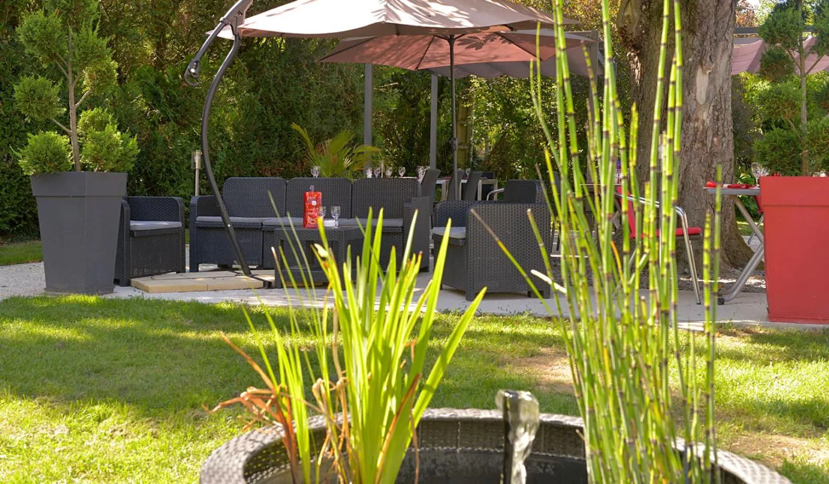 Garden in Logis Hotel Le Prieure