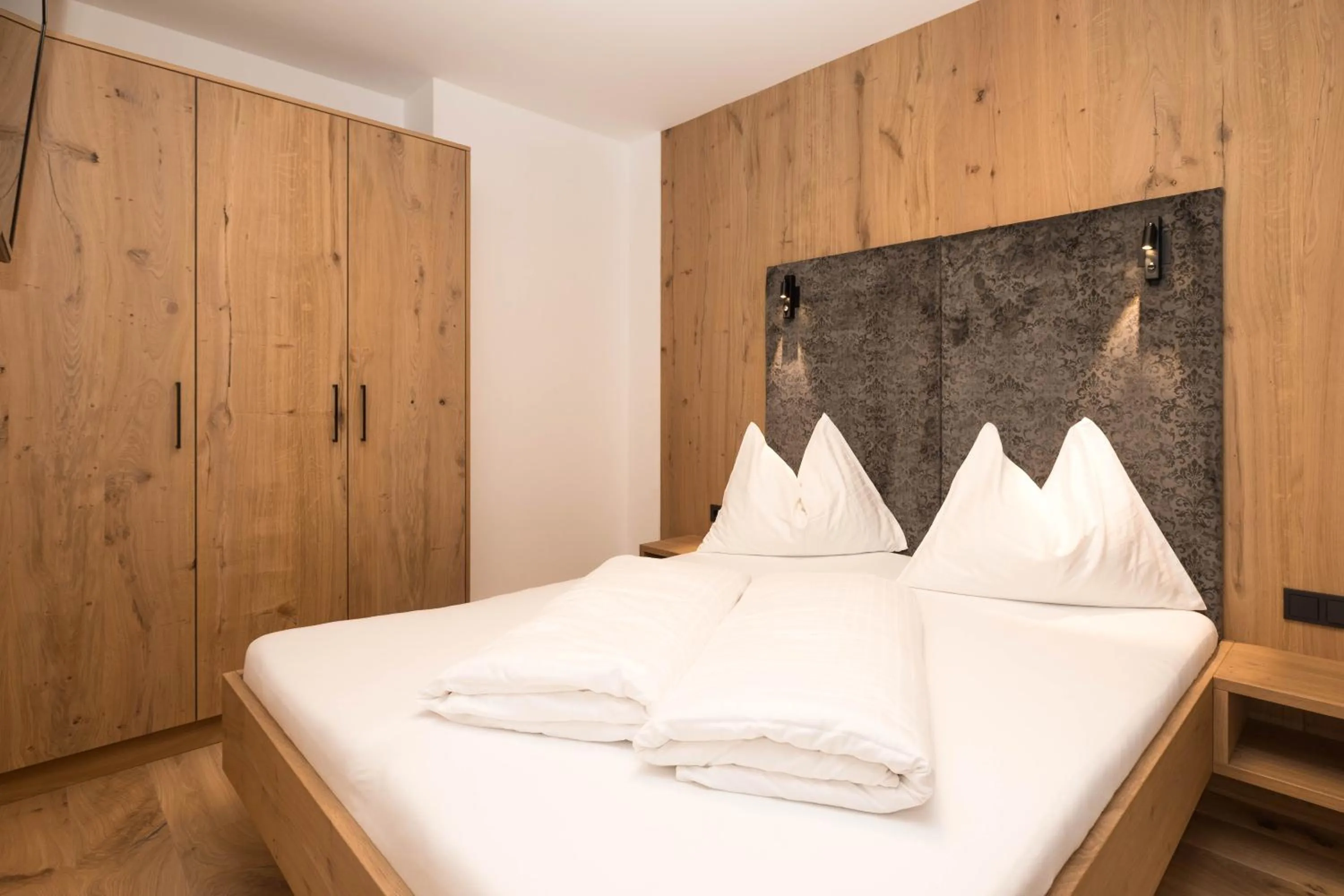 Bed in Berghotel Alpenklang