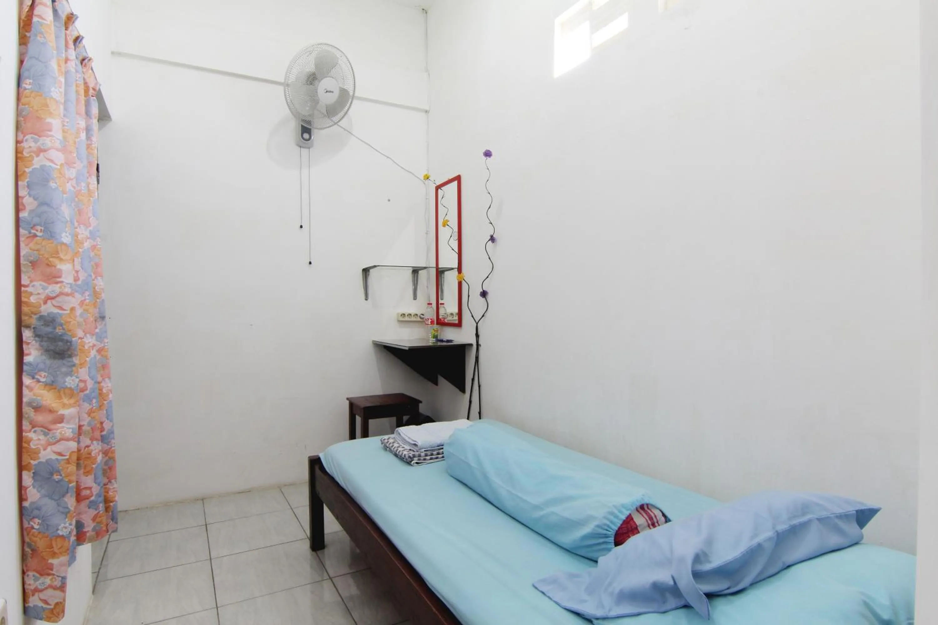 Bed in Tiga Dua Homestay