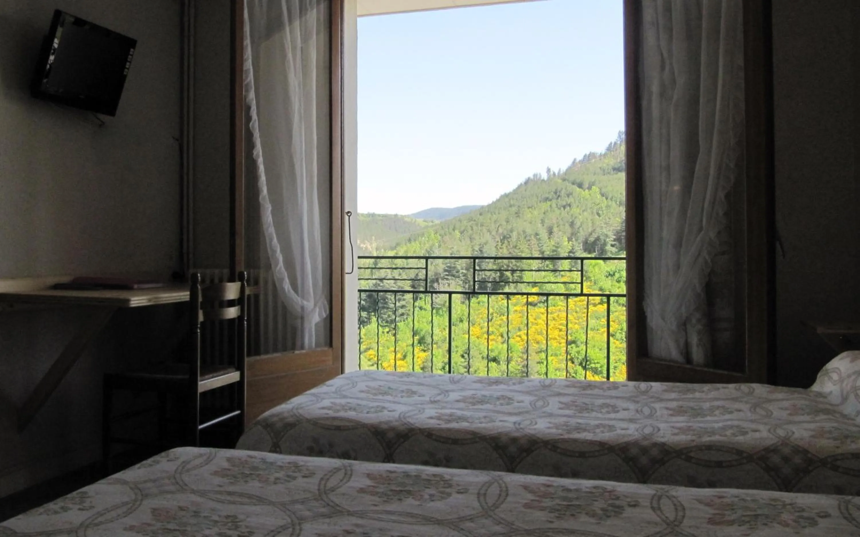 Bed in Hôtel Des Rochers