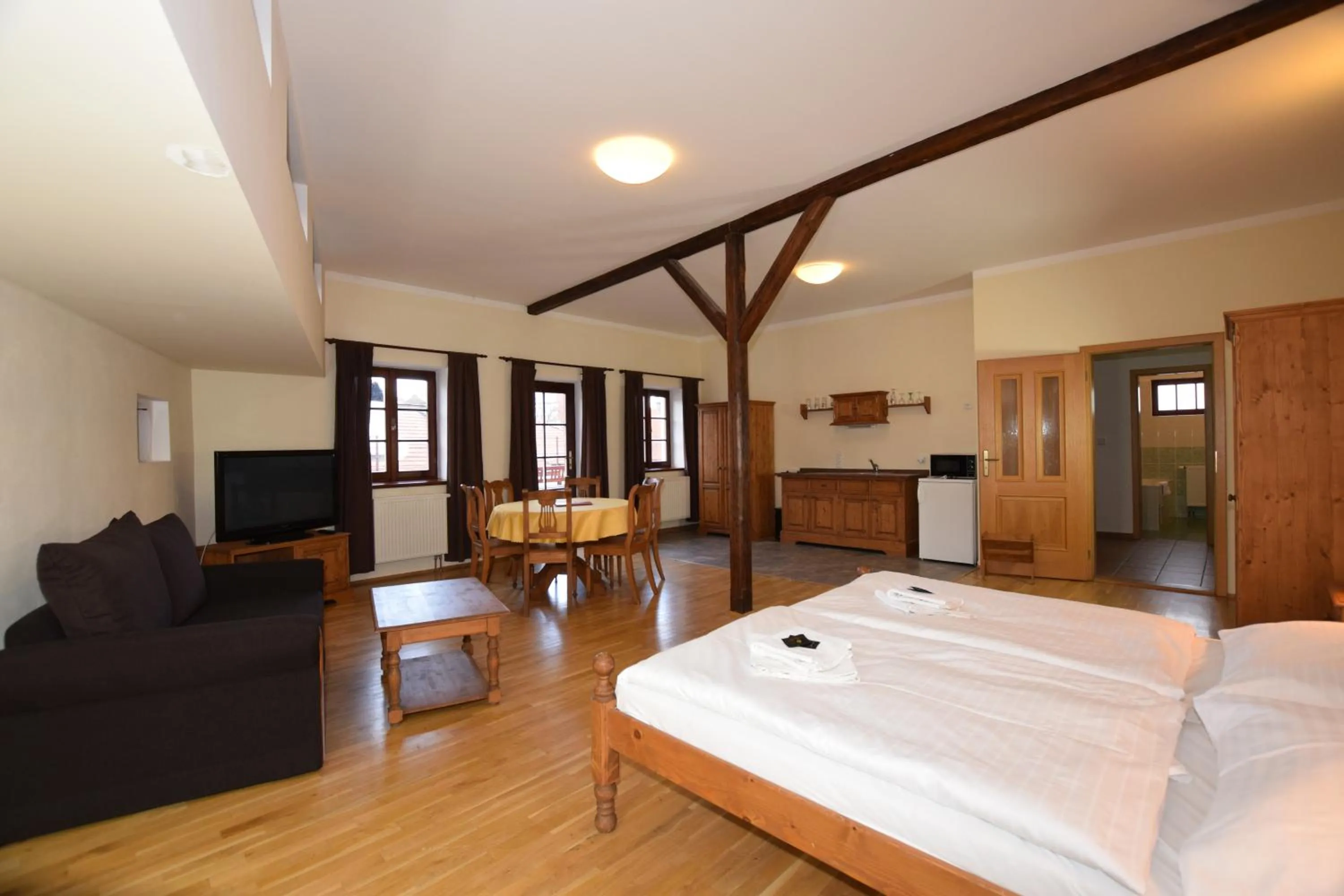 Kitchen or kitchenette, Bed in Pension Zámecká Apartmá - Castle Apartments