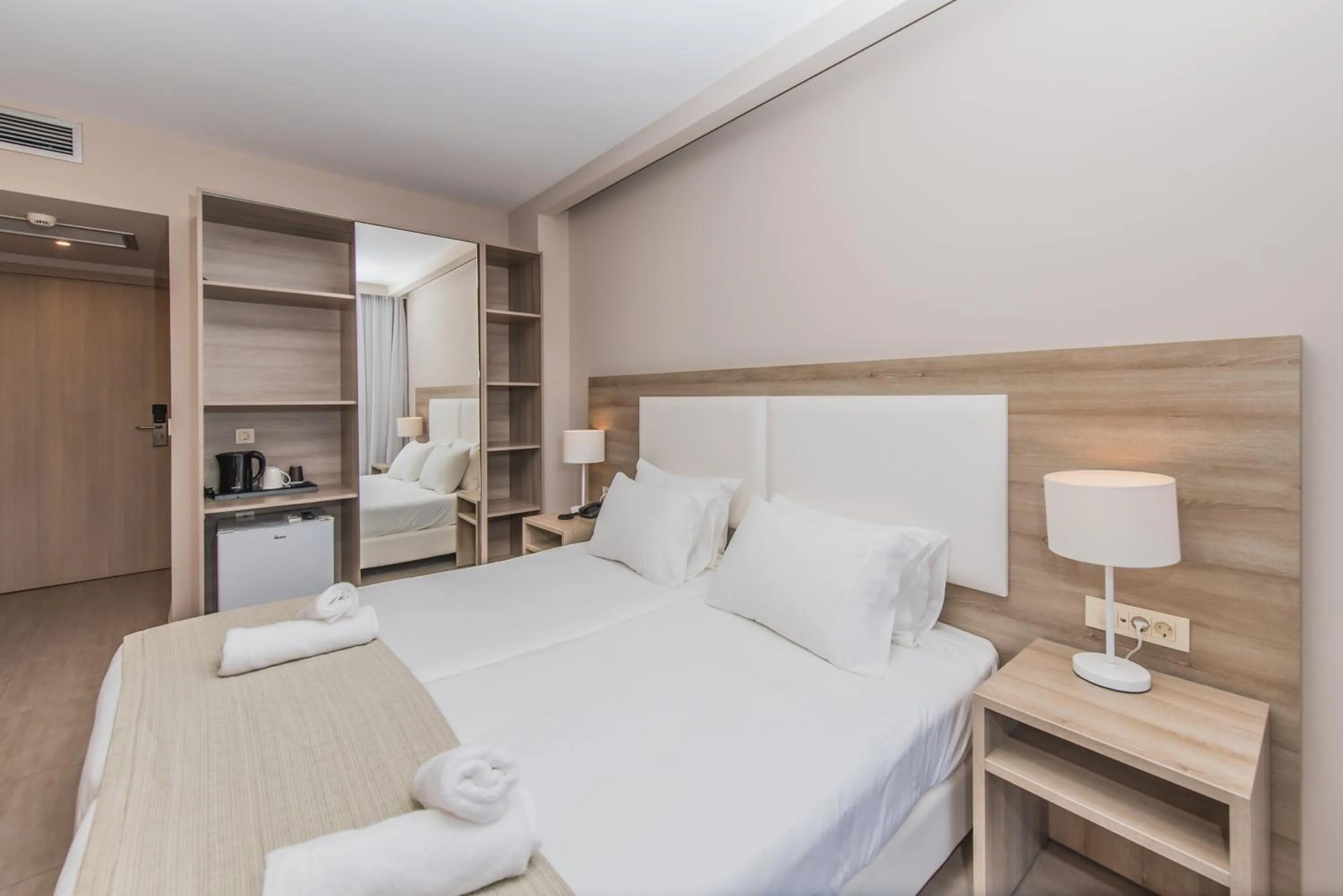 Bed in Porto Planos Beach Hotel