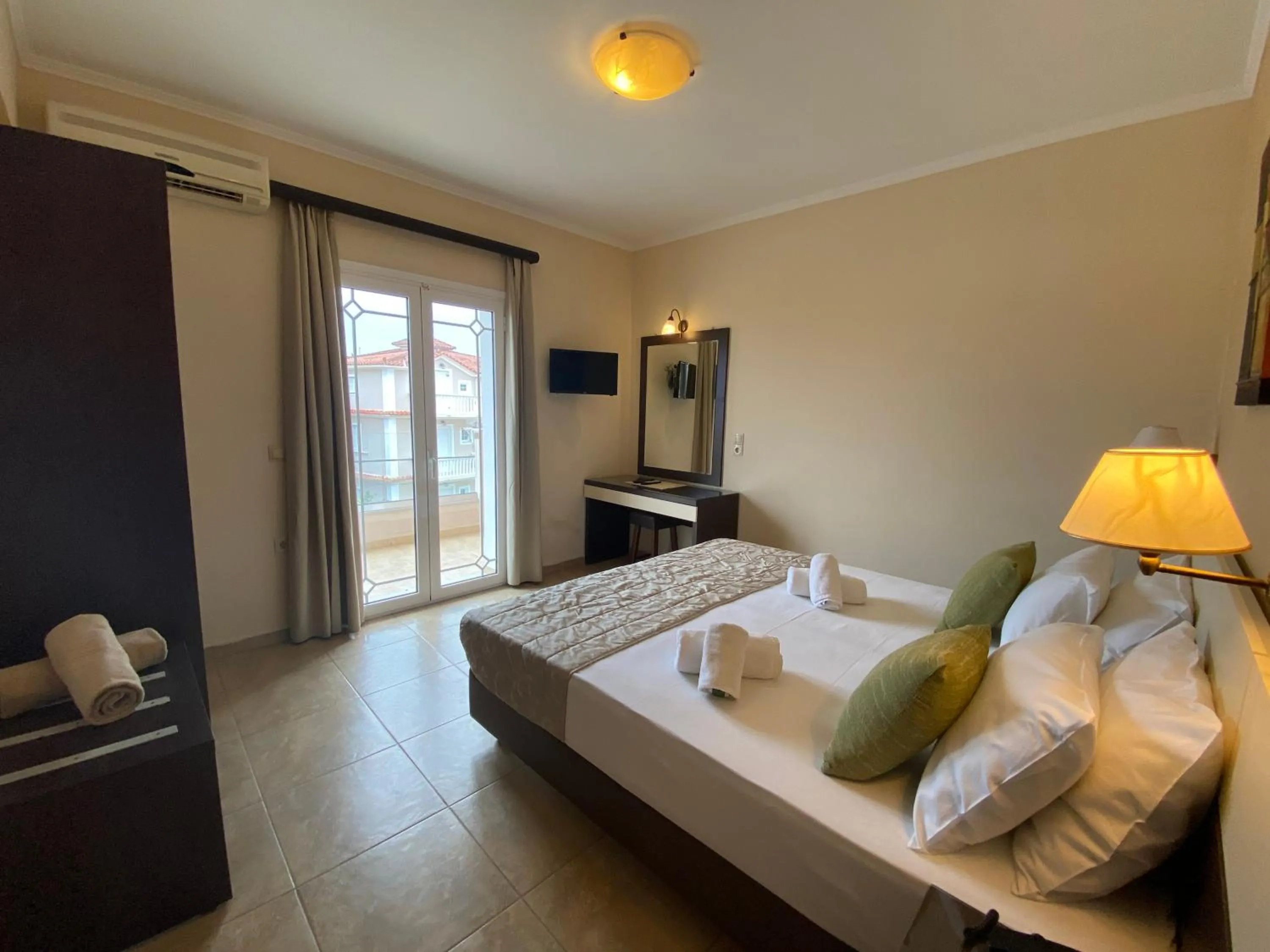 Bed in Porto Planos Beach Hotel