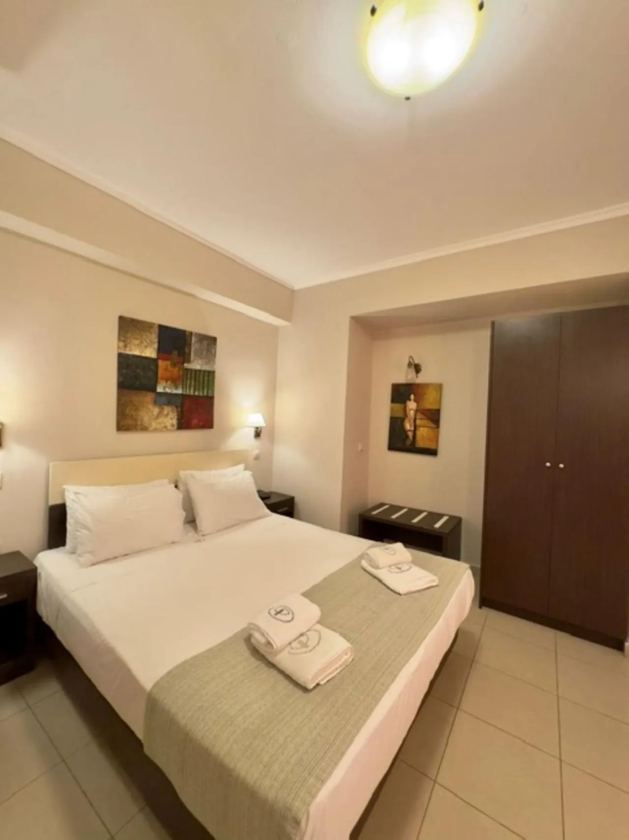 Bed in Porto Planos Beach Hotel