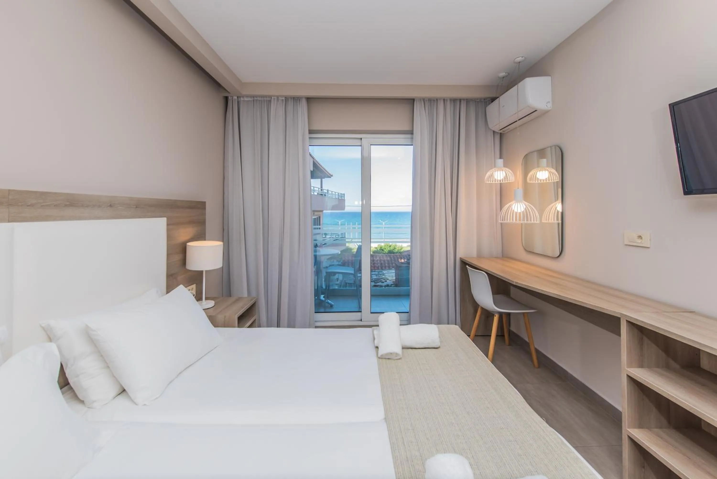 Bed in Porto Planos Beach Hotel