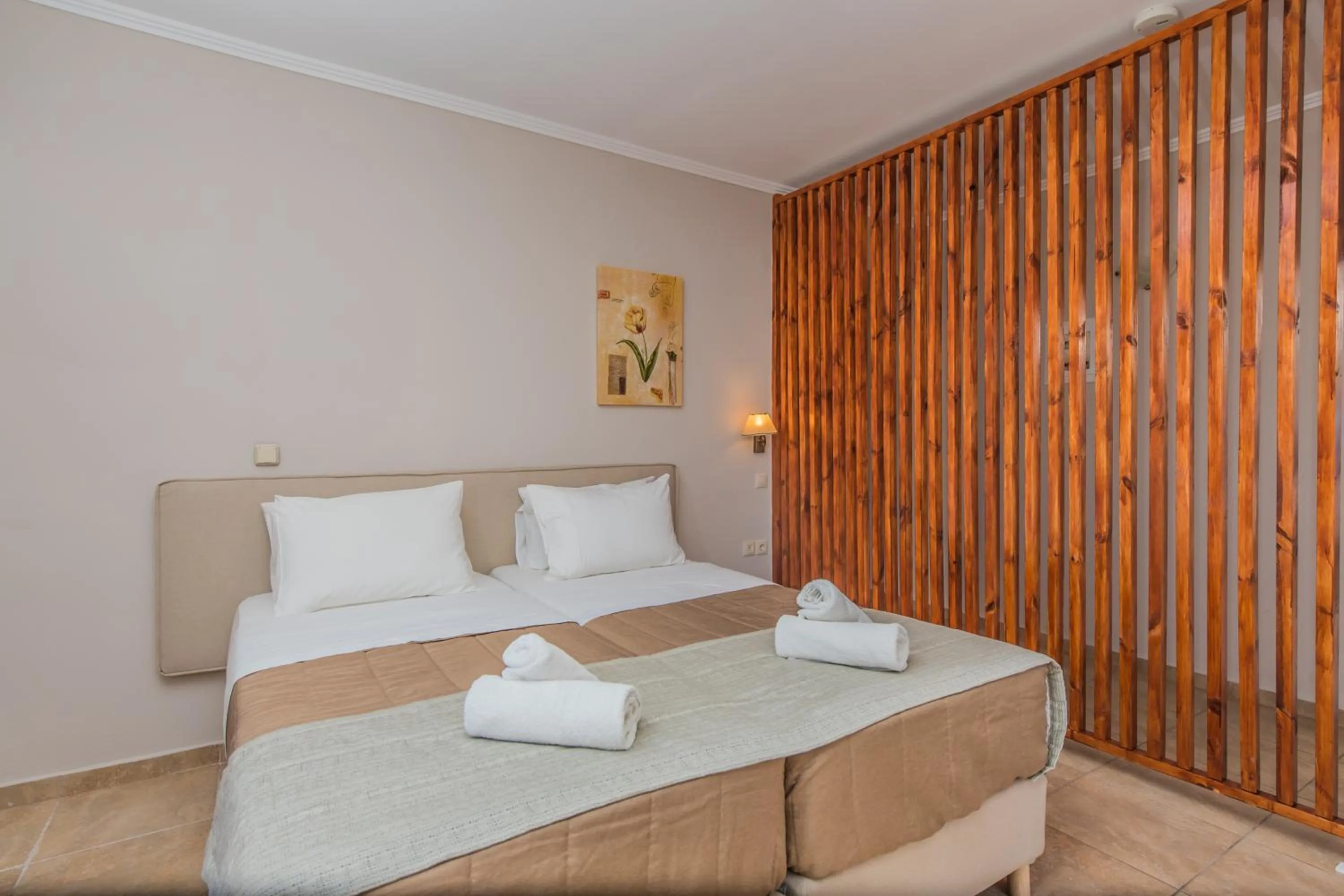 Bed in Porto Planos Beach Hotel