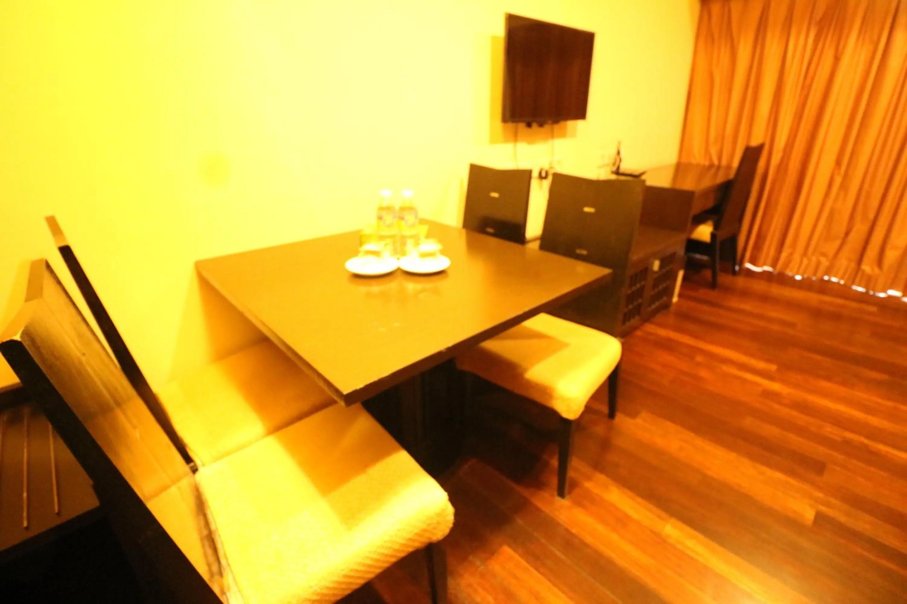 Seating area in Raintree Resort Suites