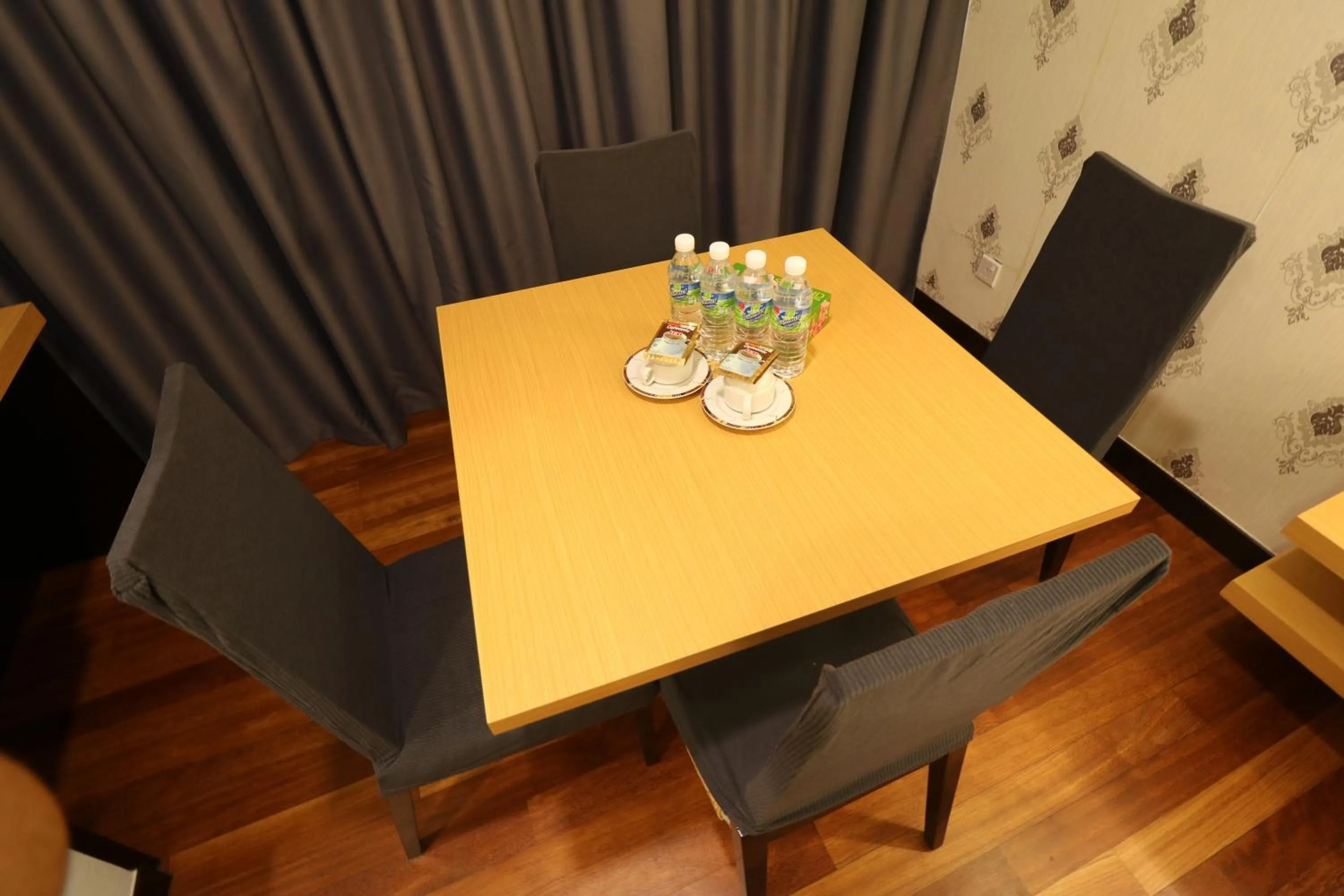 Dining area in Raintree Resort Suites