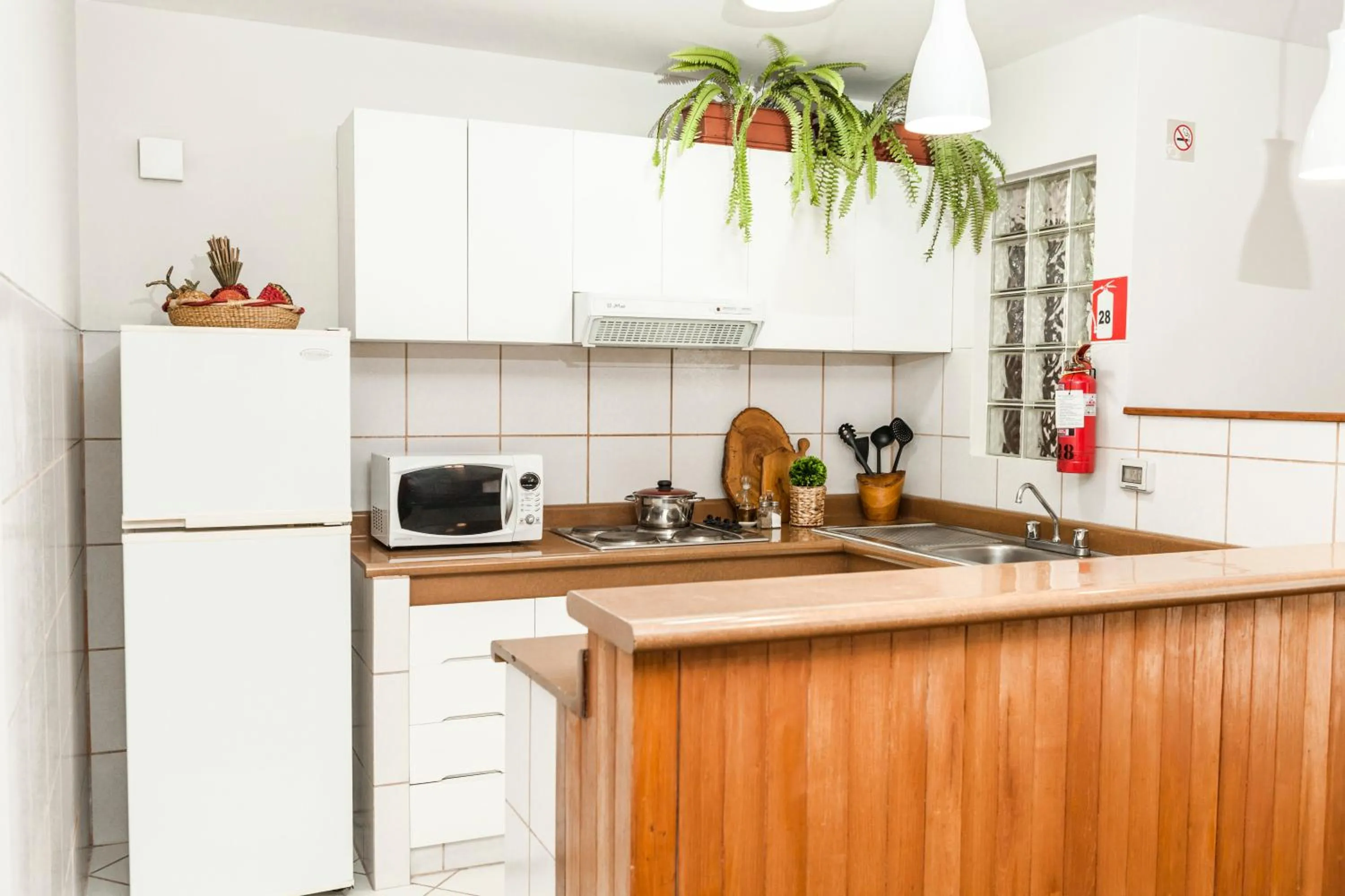 Kitchen or kitchenette in La Paz Apart Hotel