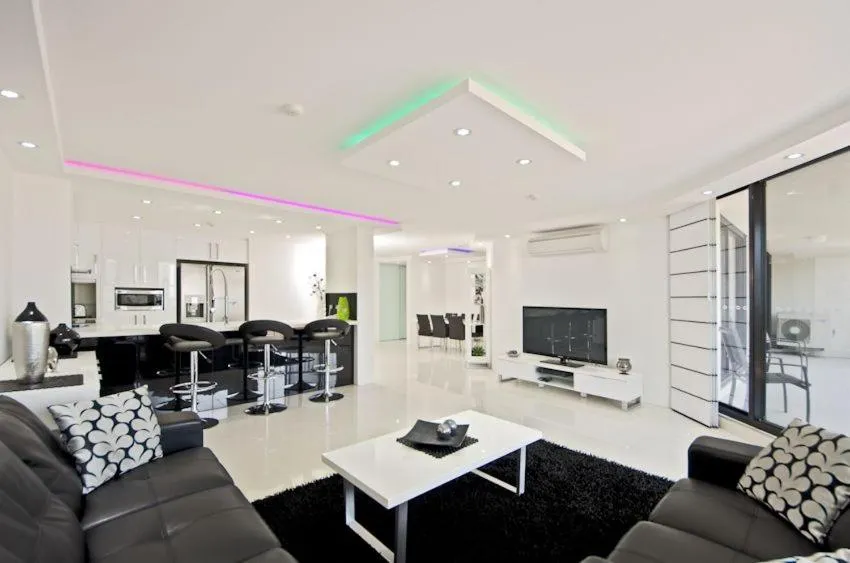 Communal lounge/ TV room in Genesis Apartments by Gold Coast Premium