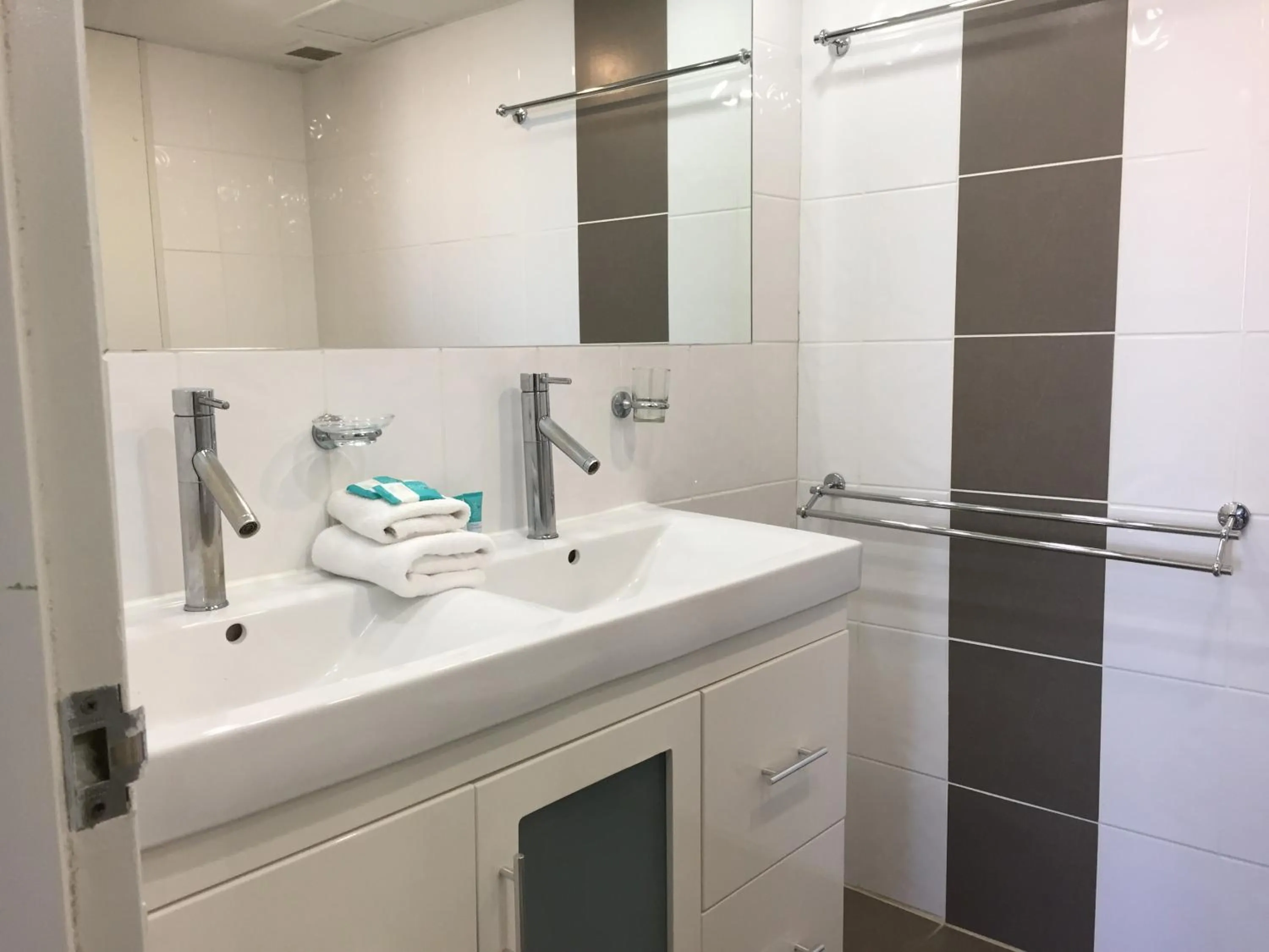 Bathroom in Genesis Apartments by Gold Coast Premium