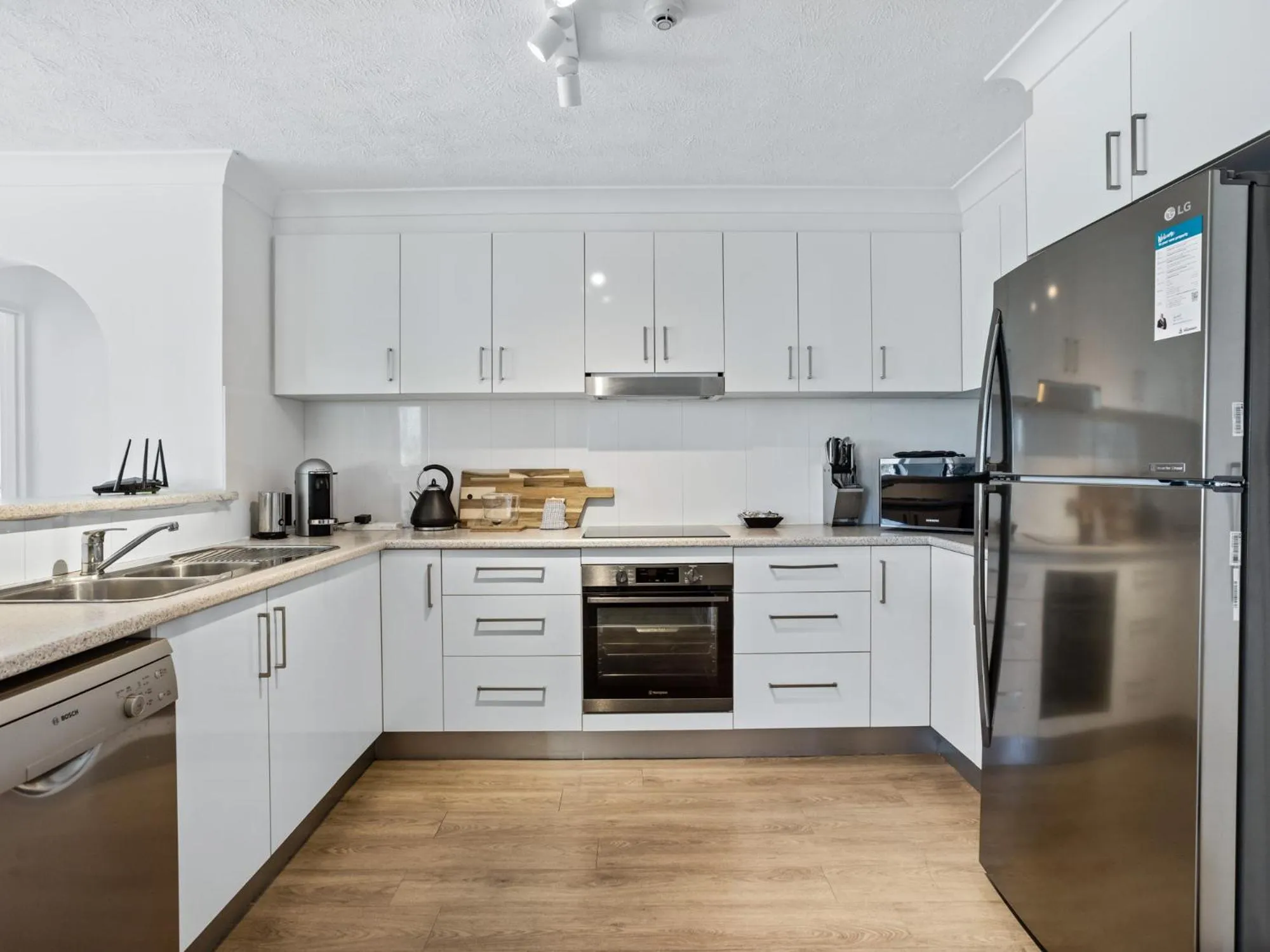 Kitchen or kitchenette in Genesis Apartments by Gold Coast Premium