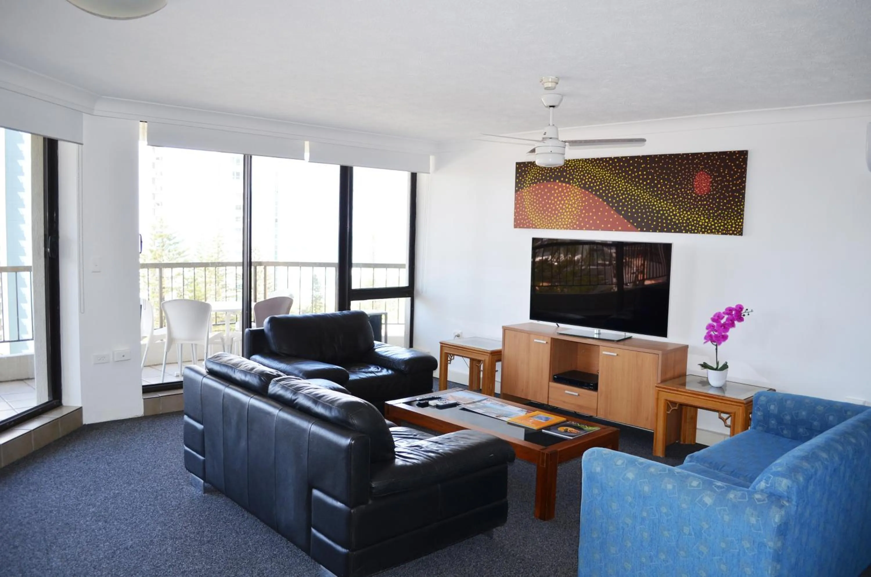 Communal lounge/ TV room in Genesis Apartments by Gold Coast Premium