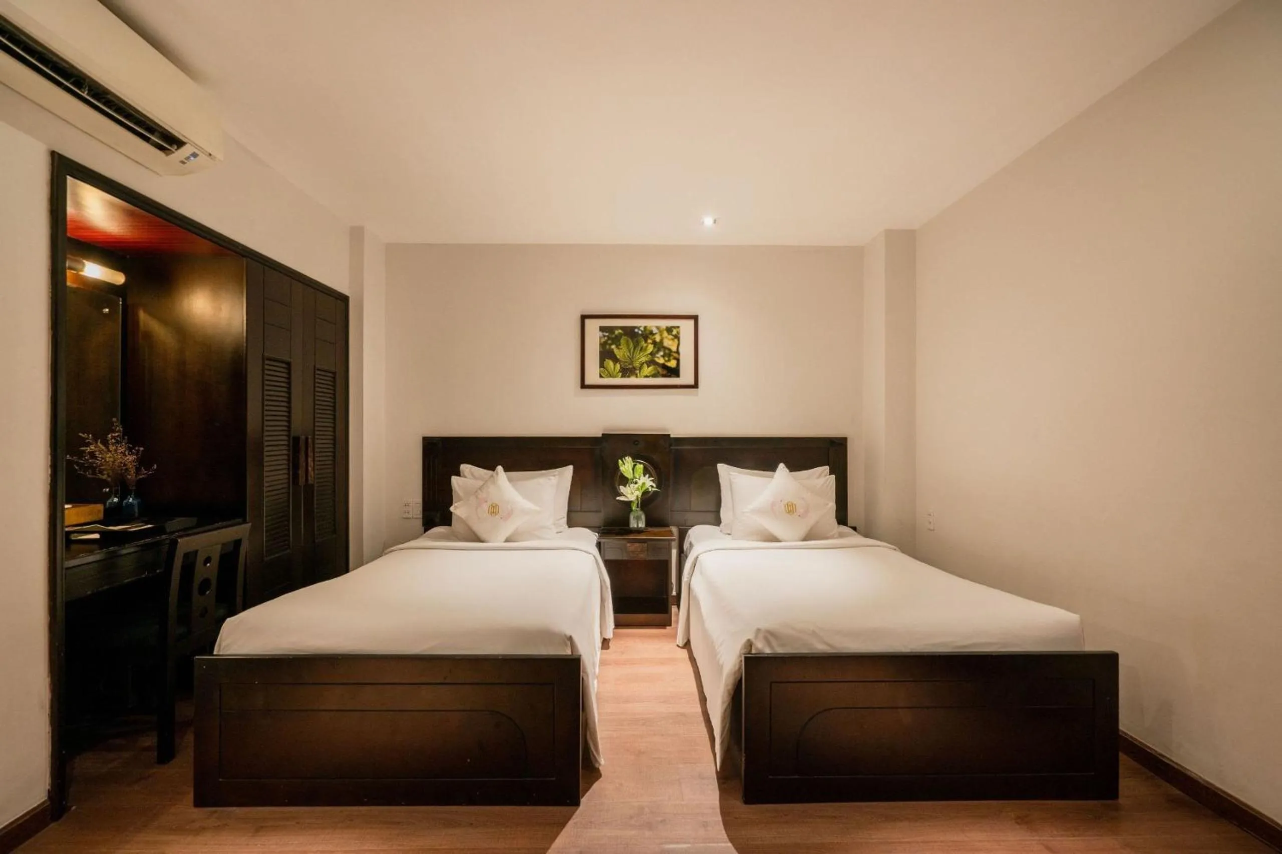 Bed in Cochin Zen Hotel