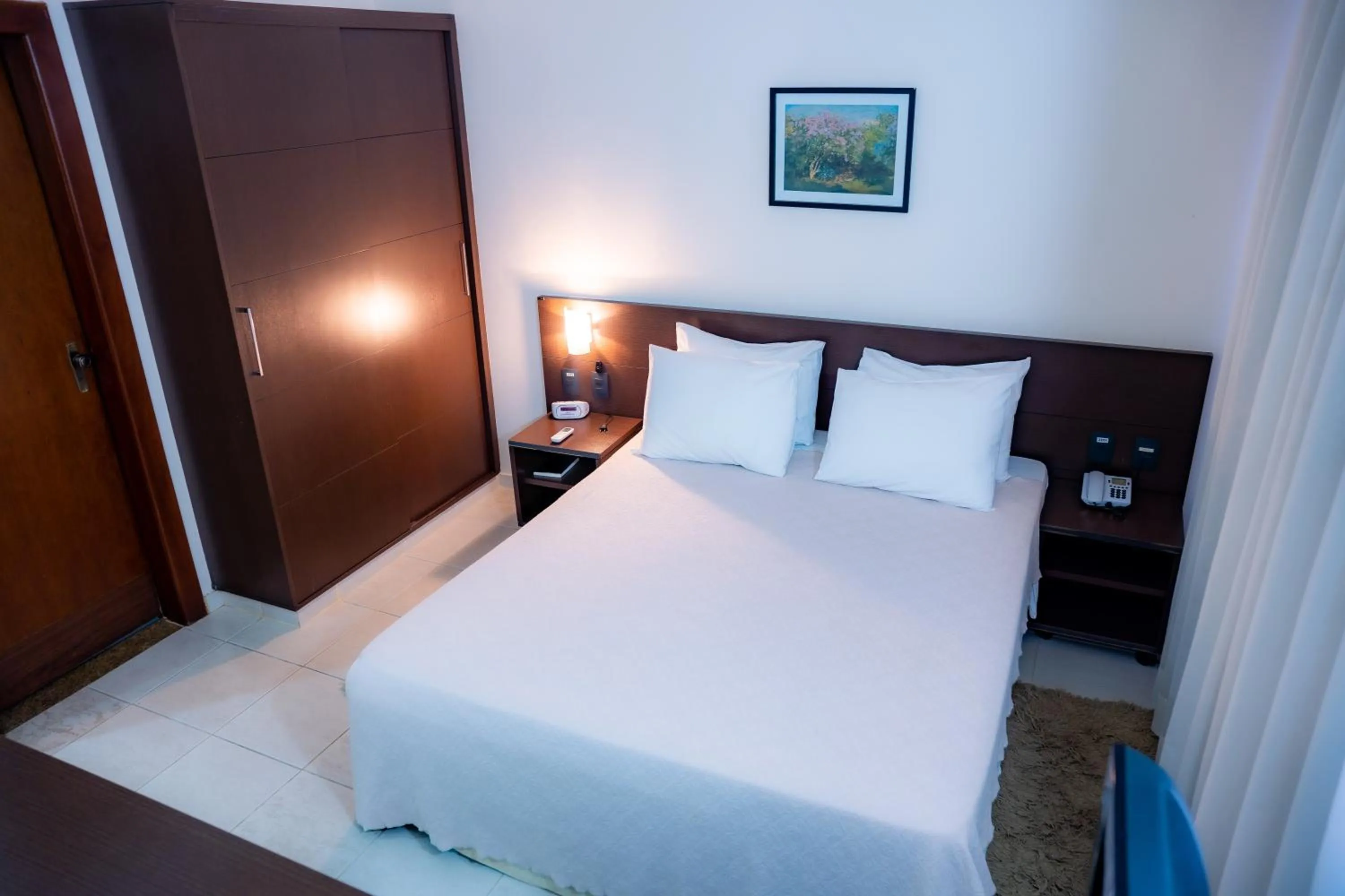 Bed in Hotel Santos Dumont