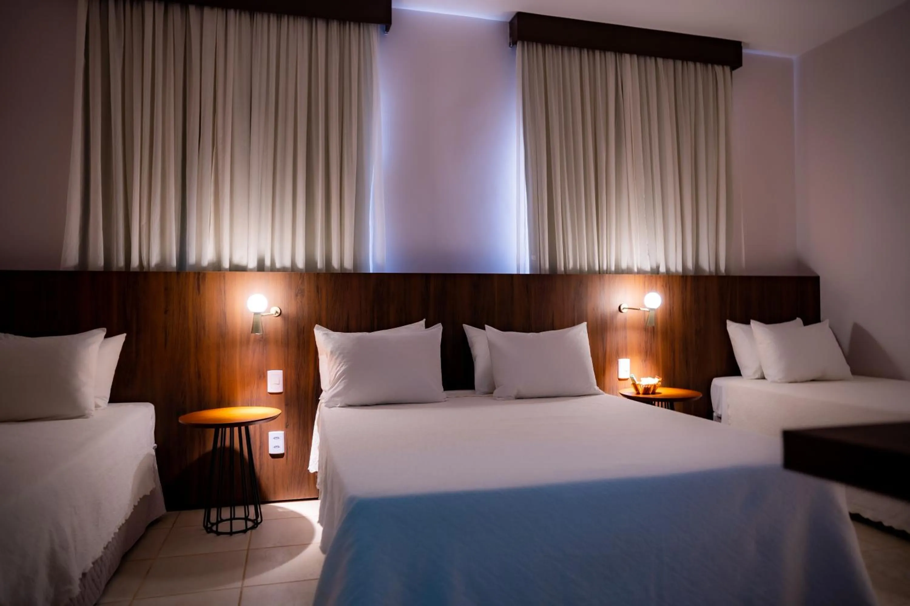 Bed in Hotel Santos Dumont