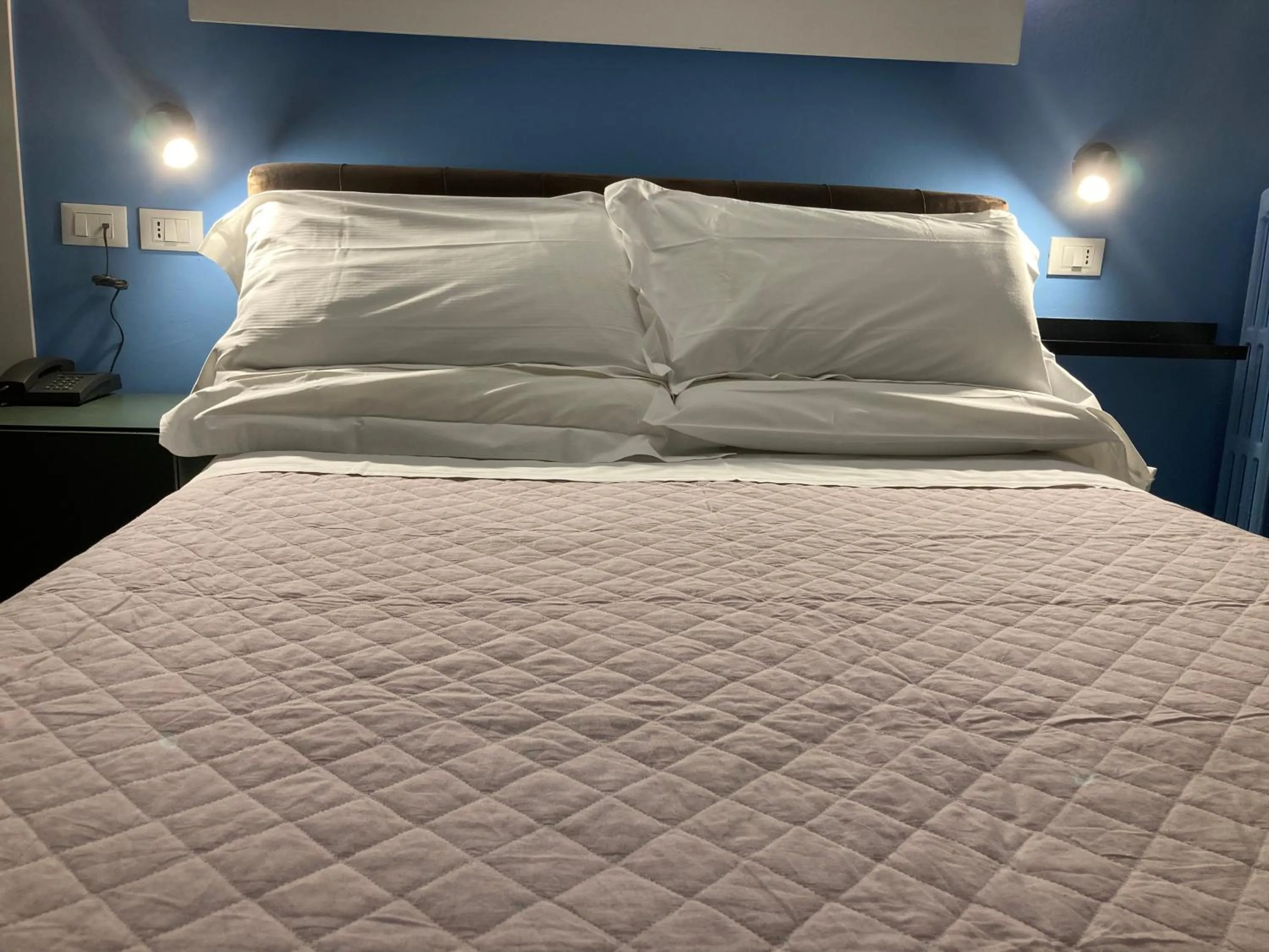 Bed in Hotel Calypso