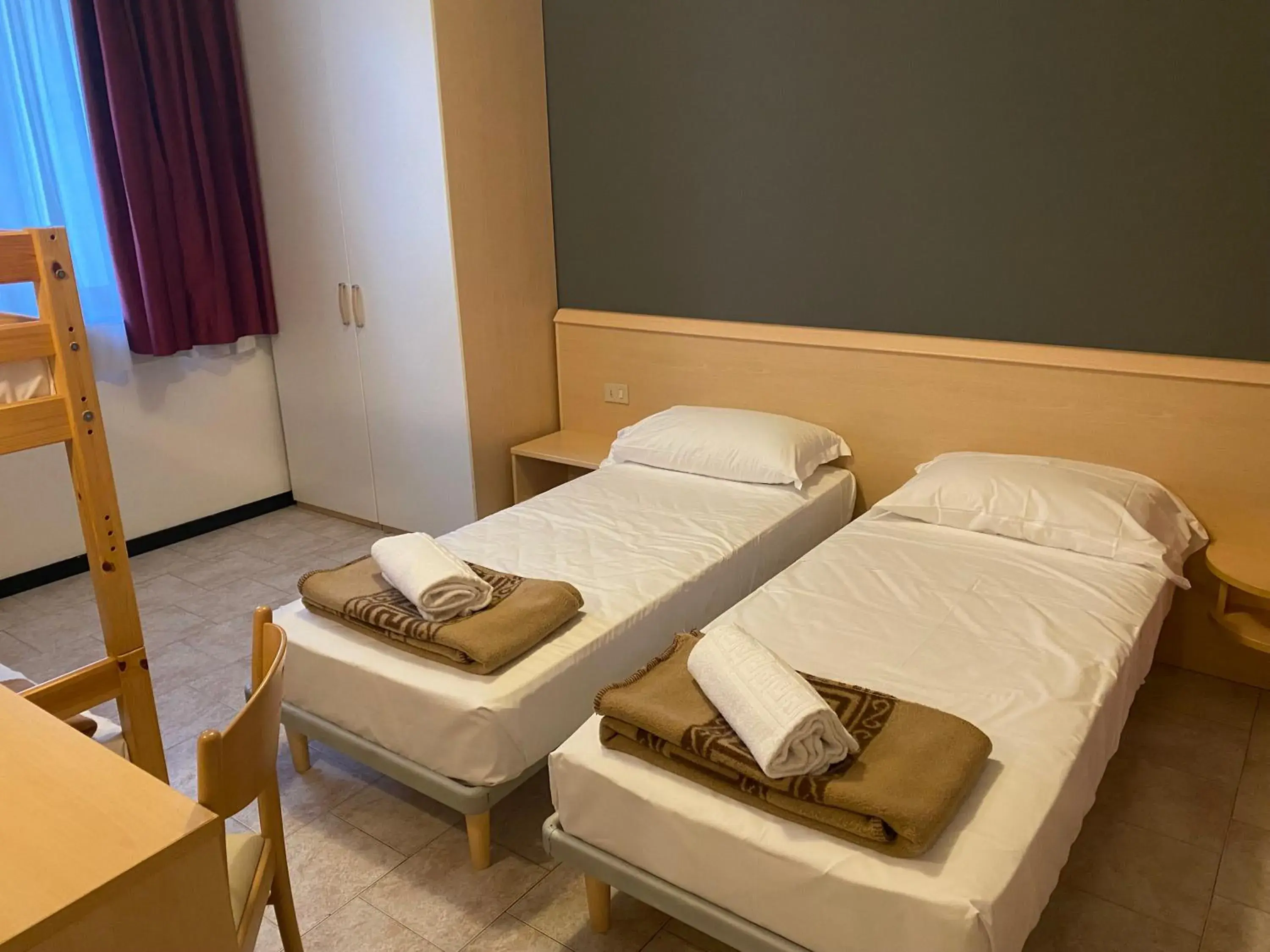 Quadruple Room in Hotel Mazzini Quadruple Room in Hotel Mazzini