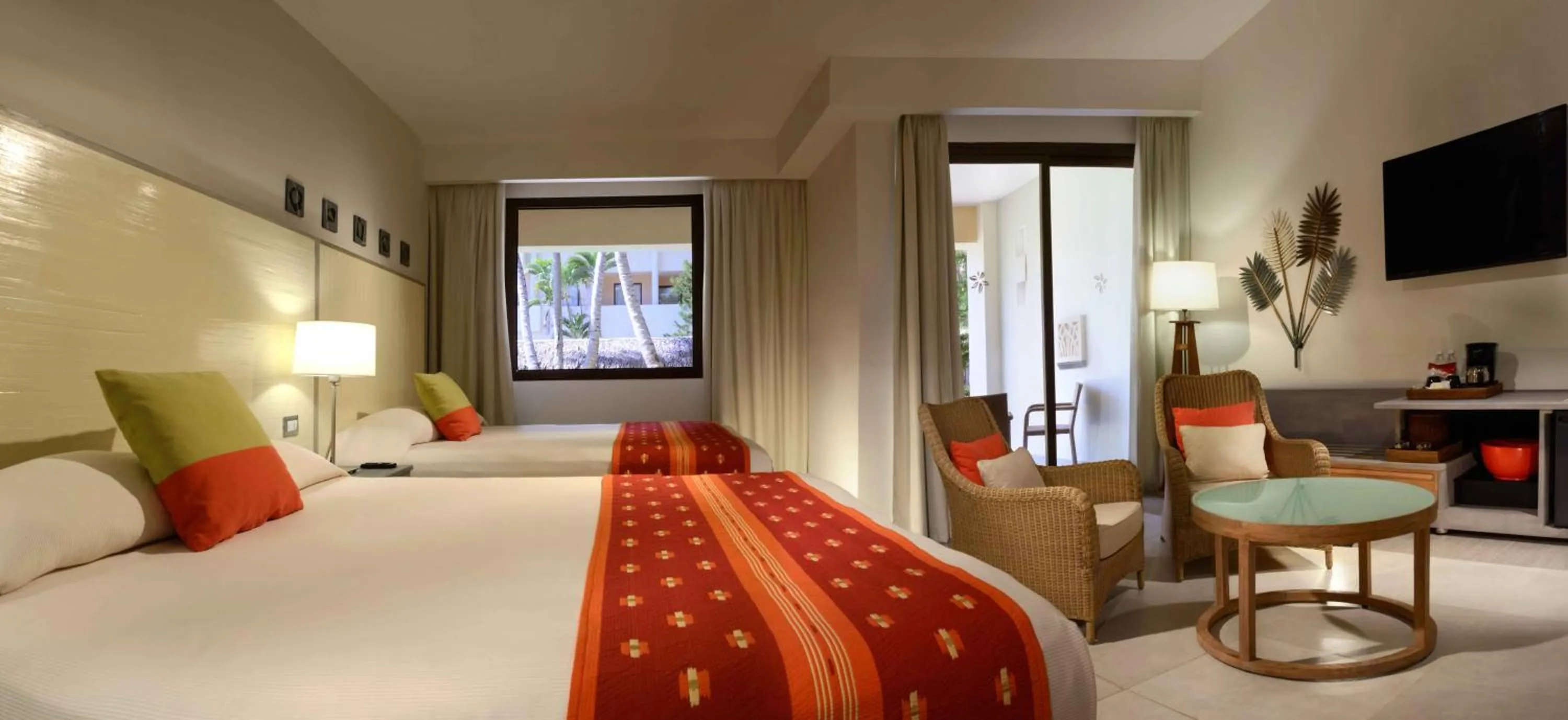 Living room, Bed in Catalonia Punta Cana - All Inclusive