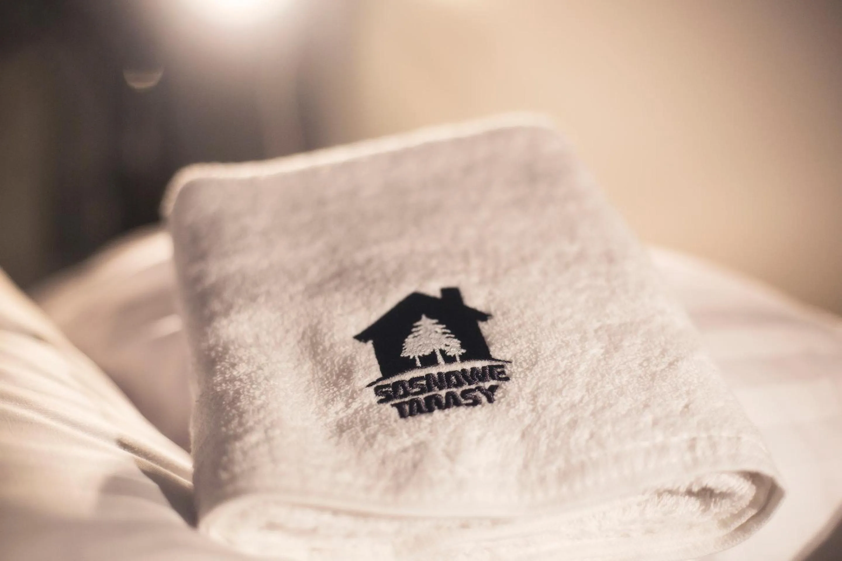 Property logo or sign in Sosnowe Tarasy