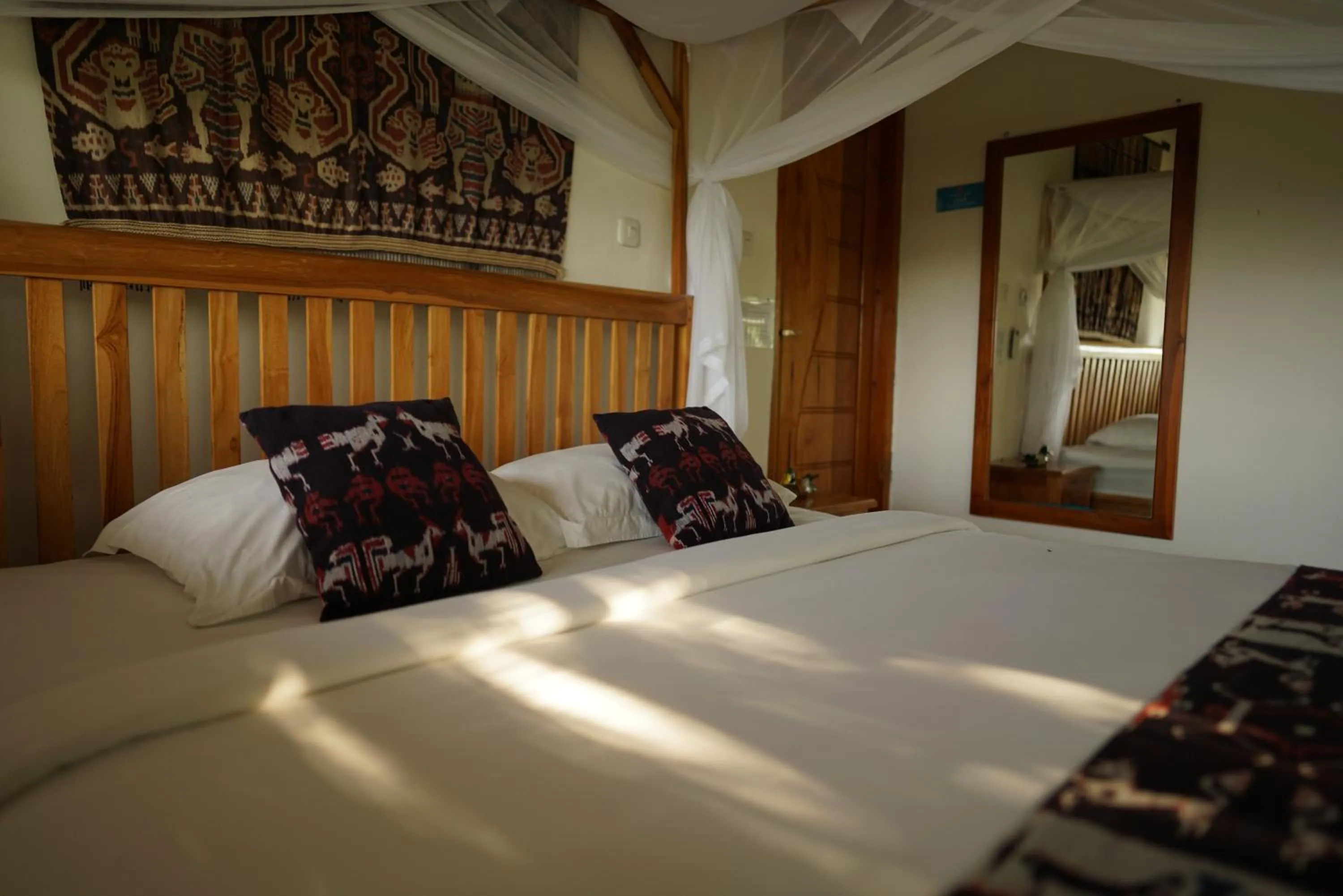 Bed in Morinda Villa and Resto