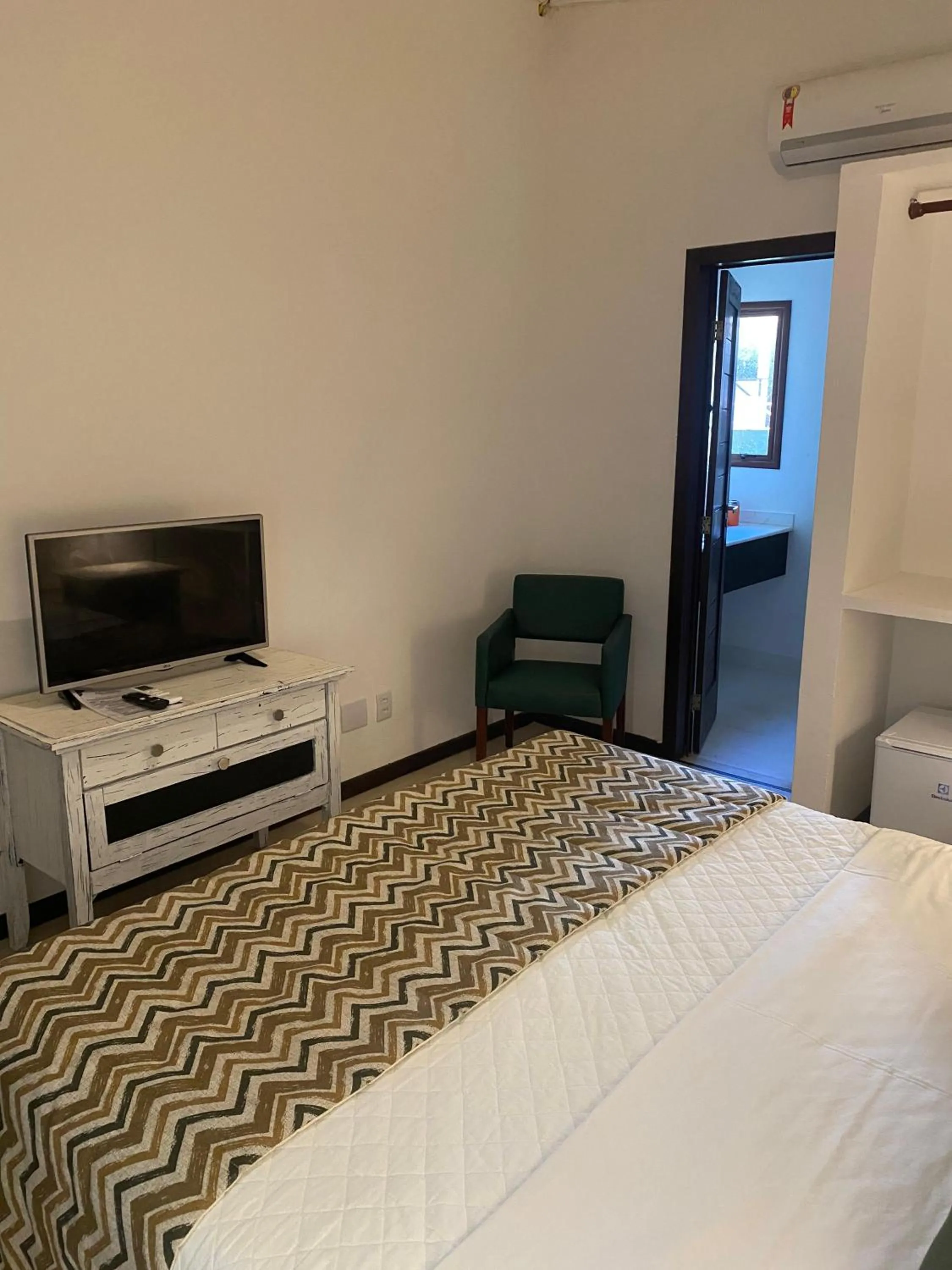 Bed in Girassóis Suítes